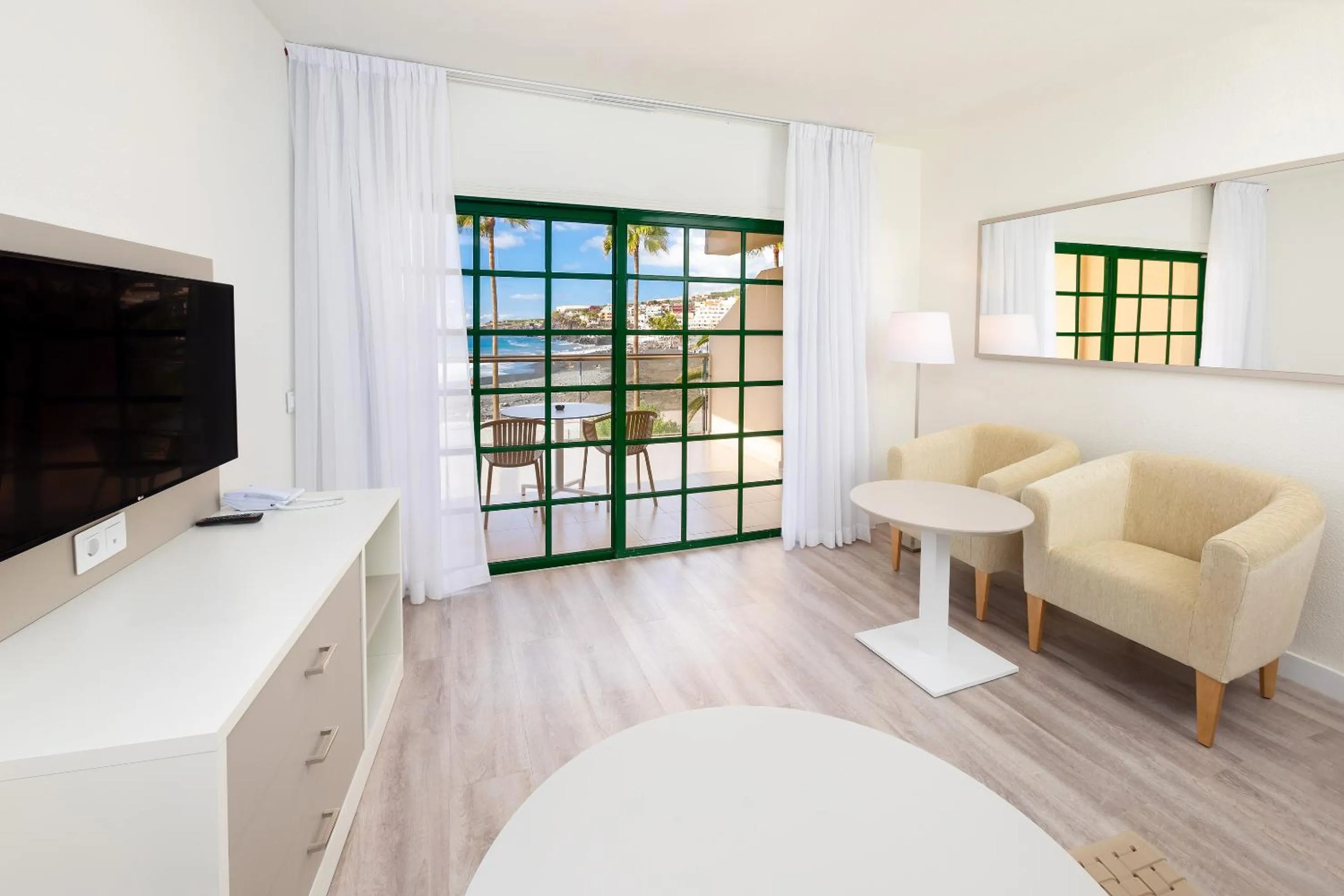 Communal lounge/ TV room, Bed in Apartments La Palma, Affiliated by Meliá