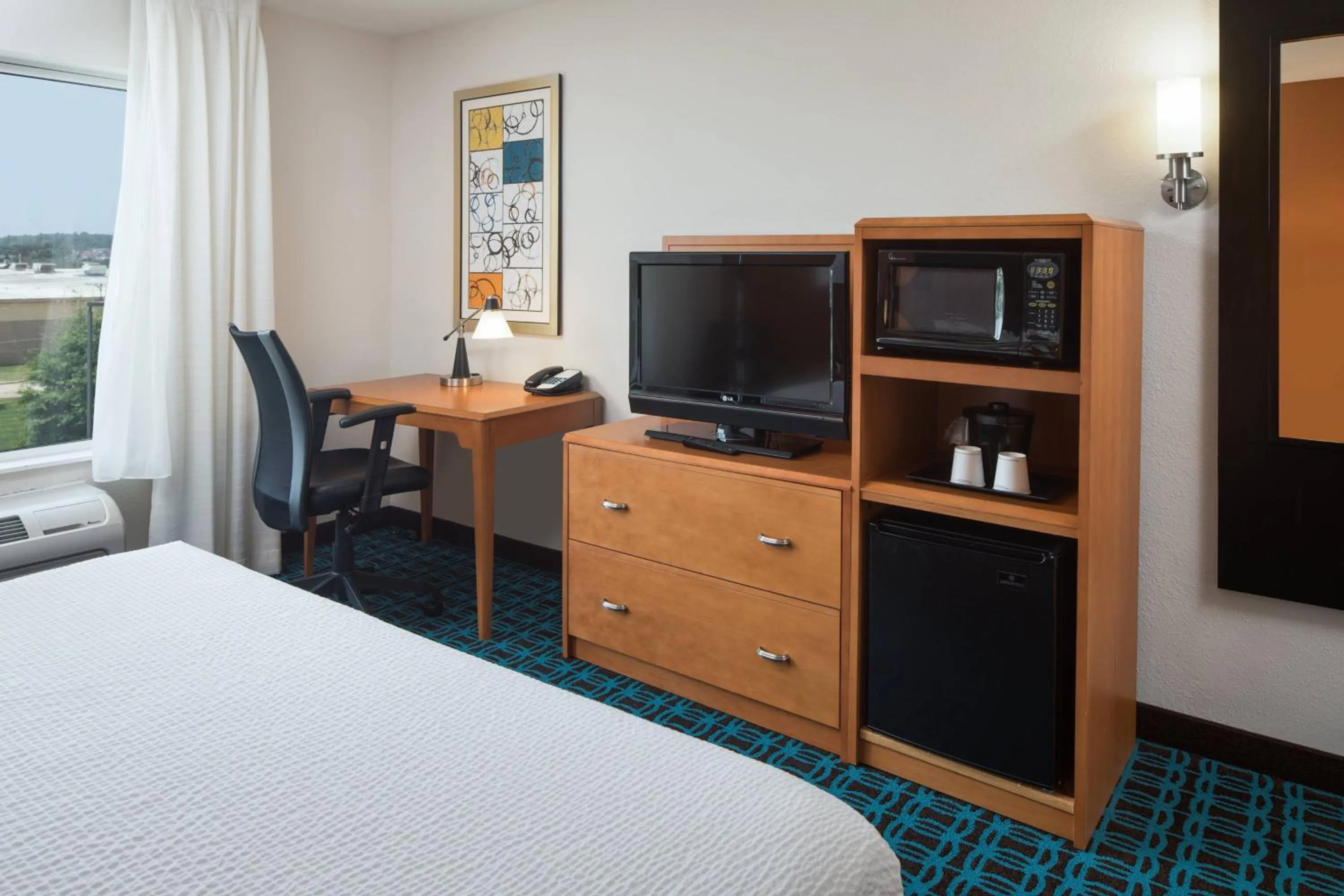 Photo of the whole room, Bed in Fairfield Inn and Suites by Marriott Conway