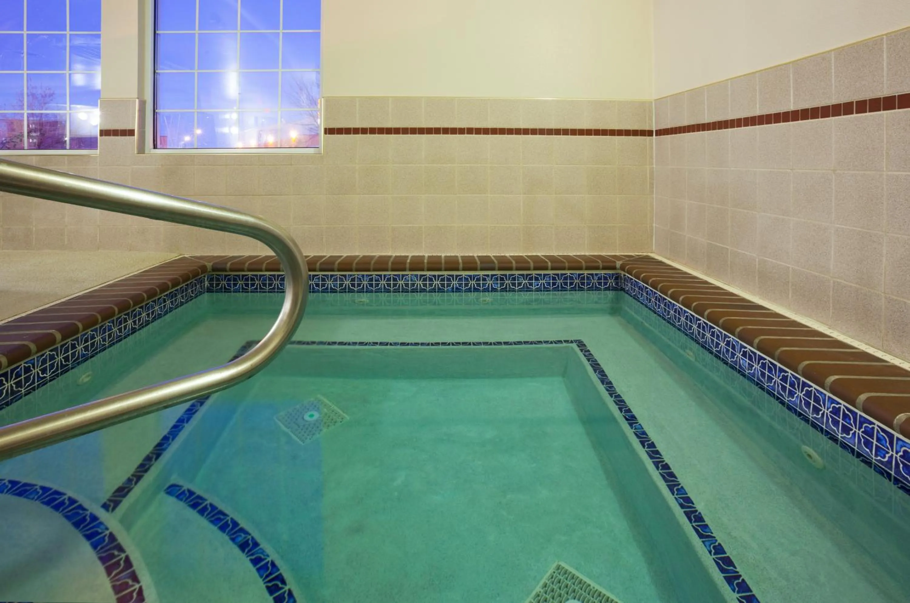 Swimming pool in Holiday Inn Express Hotel & Suites Sioux Falls At Empire Mall by IHG
