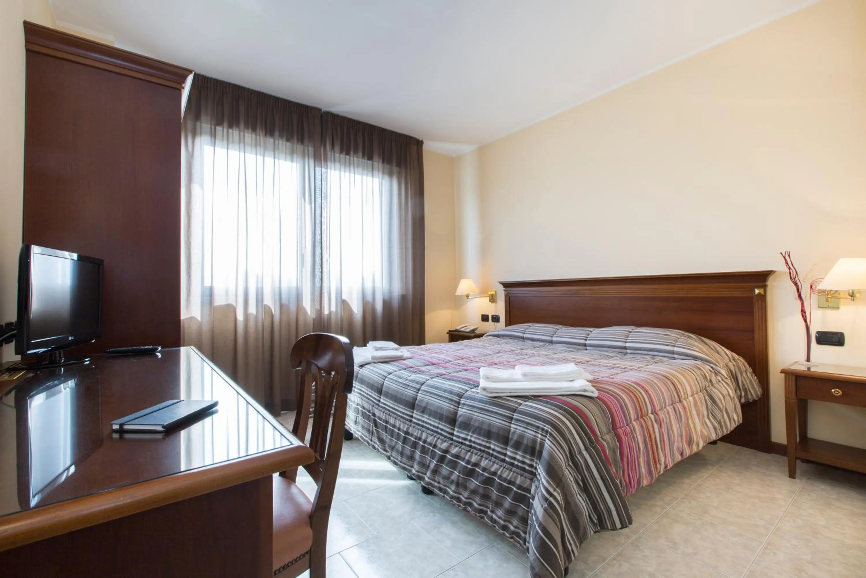 Photo of the whole room, Bed in Hotel Fidenza