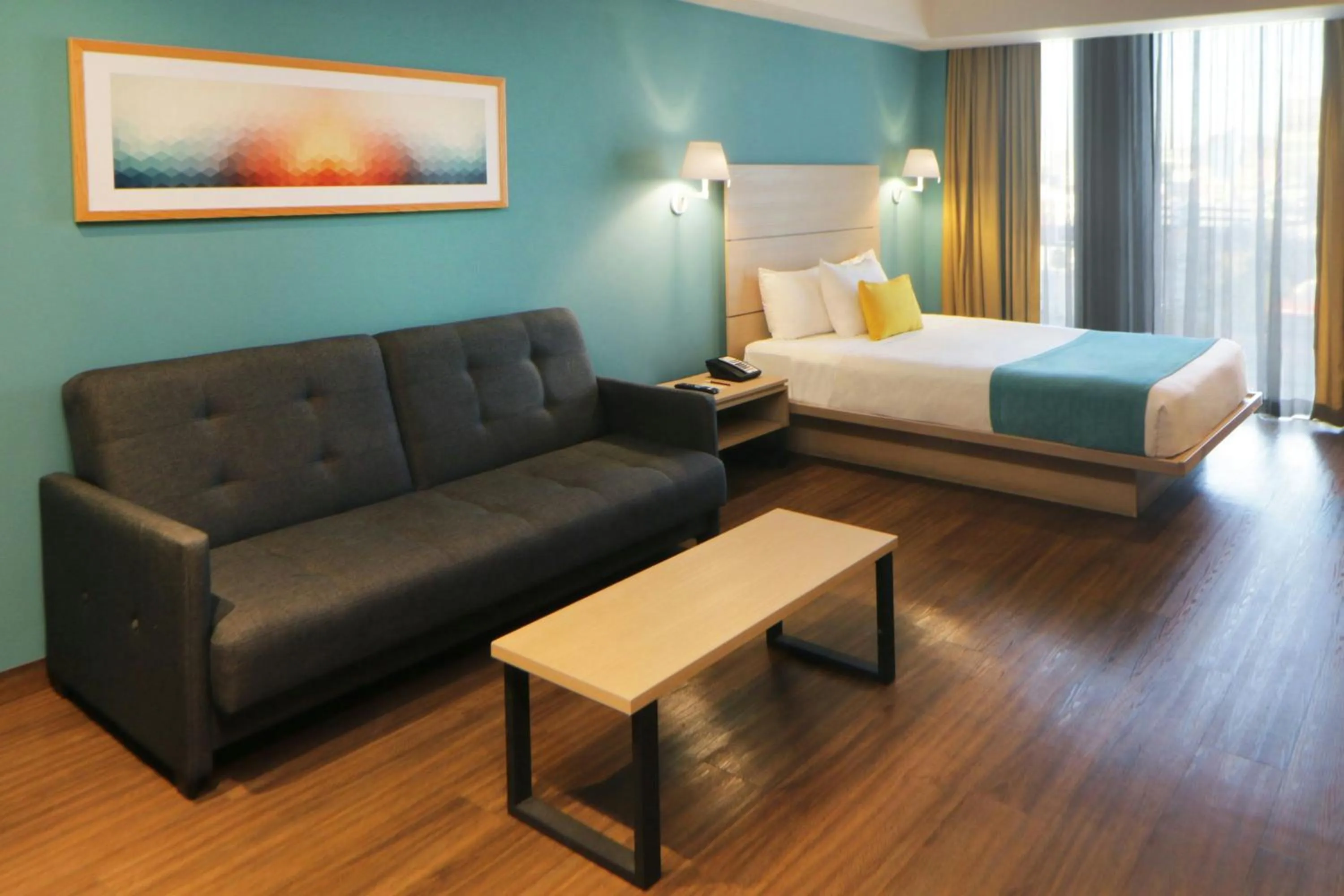 Bedroom, Bed in City Express Suites by Marriott Tijuana Rio