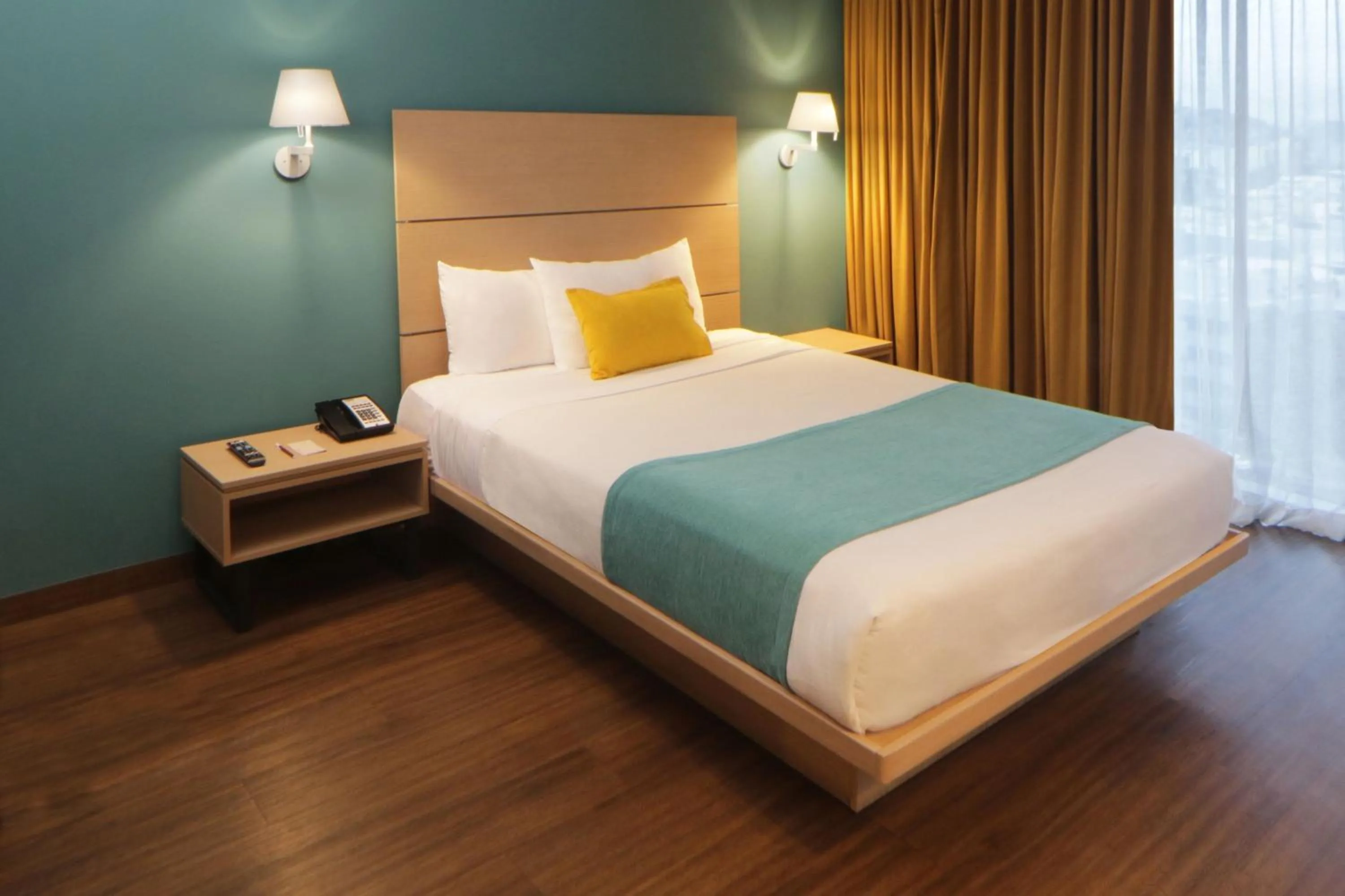 Bedroom, Bed in City Express Suites by Marriott Tijuana Rio