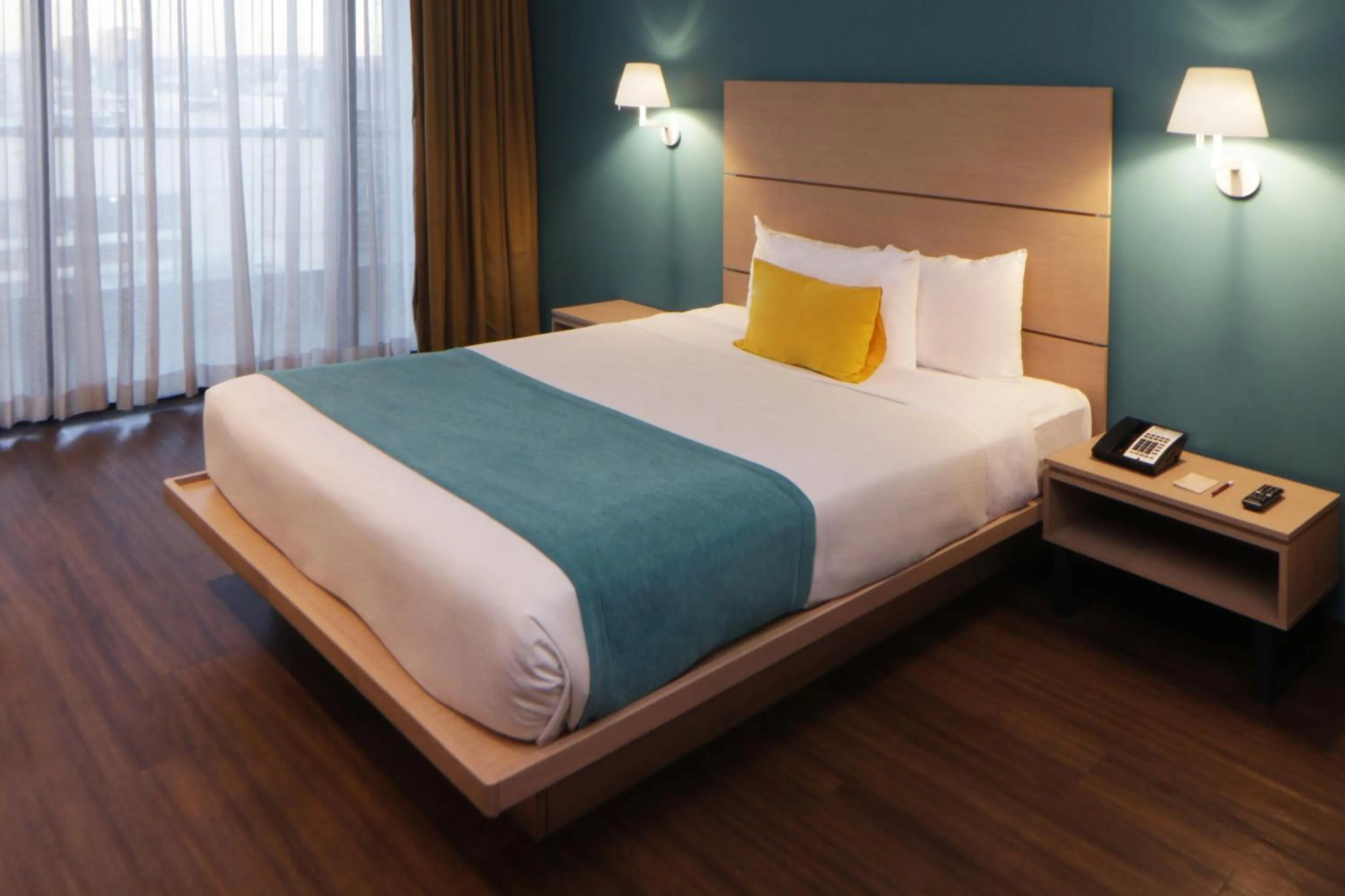 Bedroom, Bed in City Express Suites by Marriott Tijuana Rio