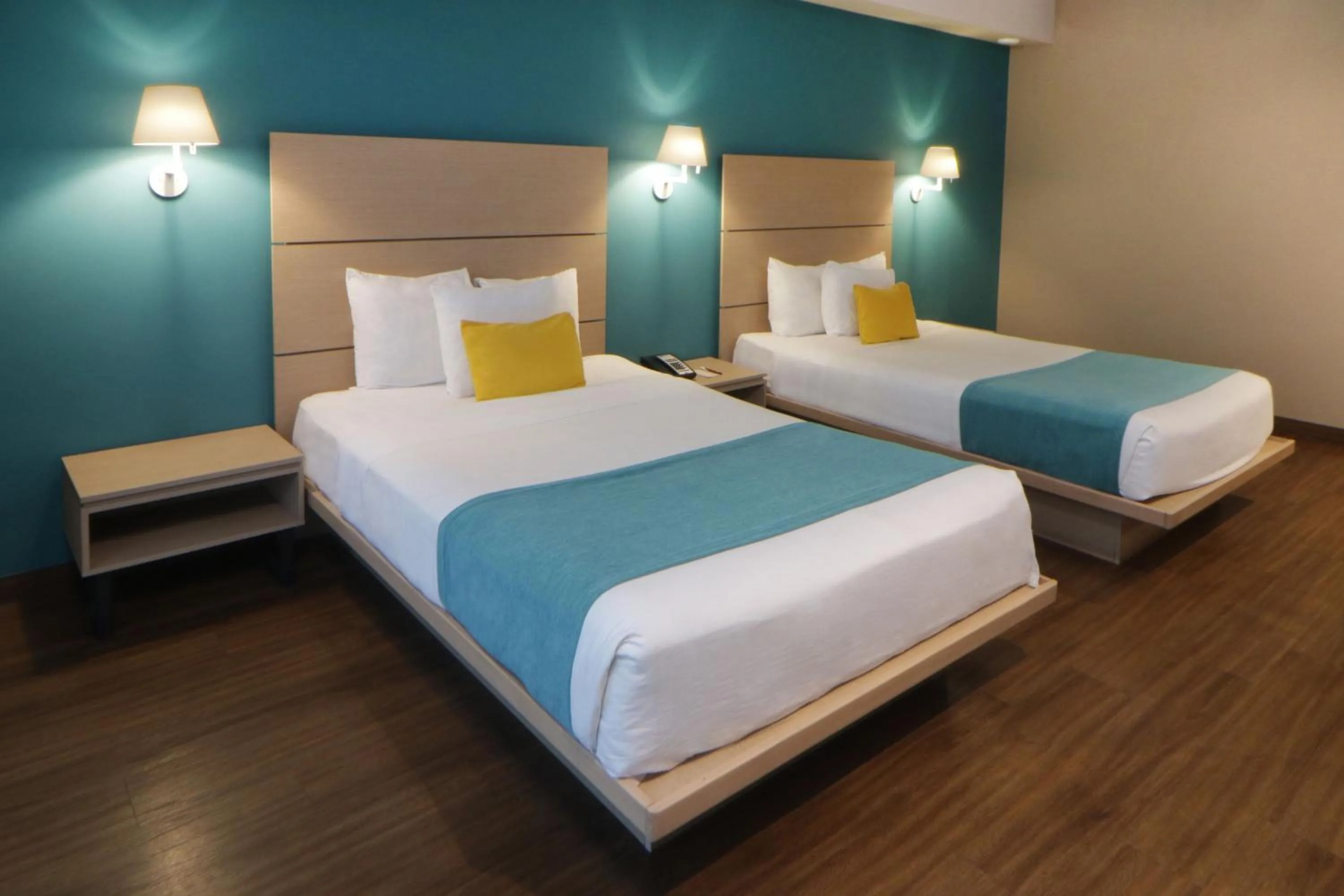 Bedroom, Bed in City Express Suites by Marriott Tijuana Rio