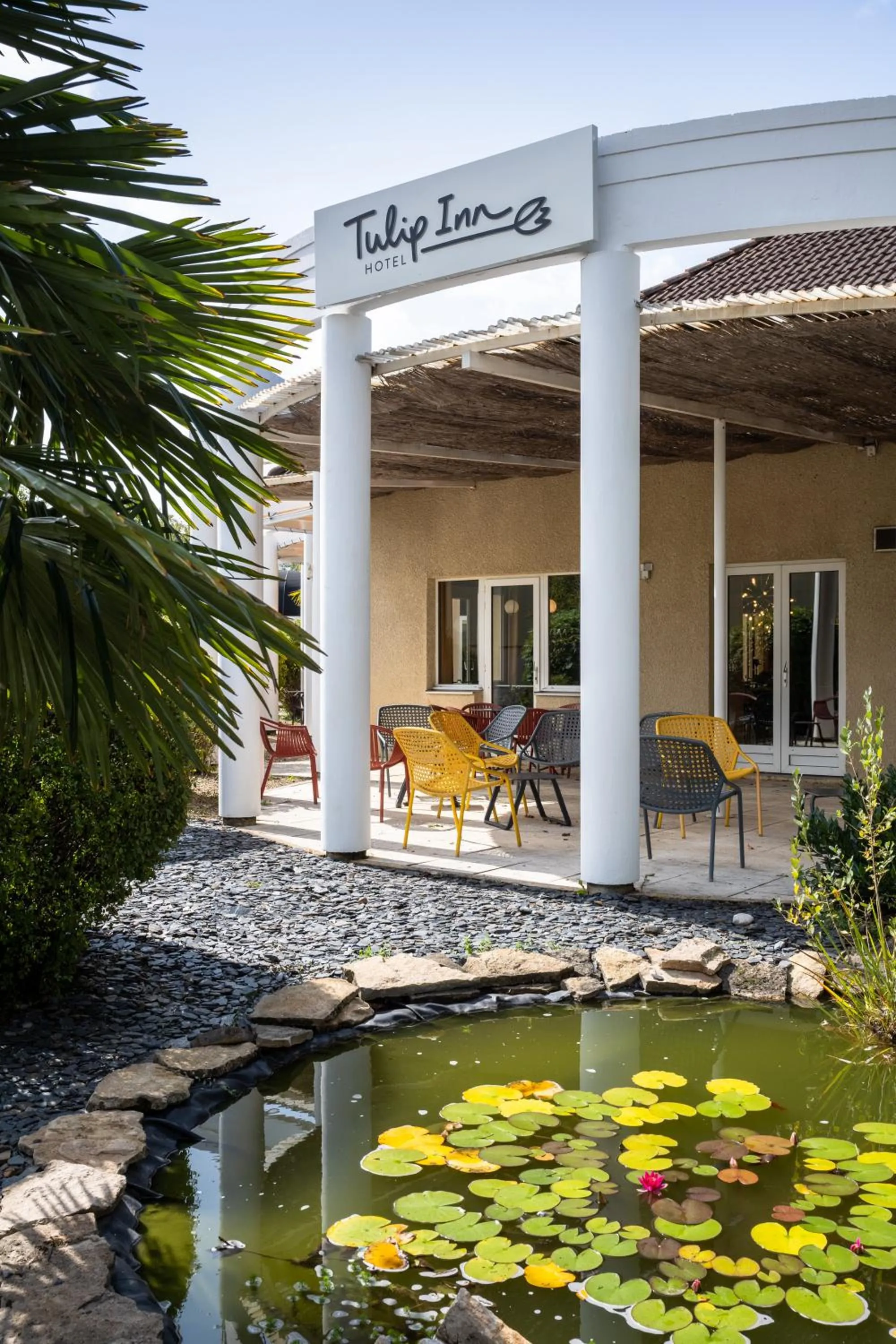 Property logo or sign in Tulip Inn Beaune