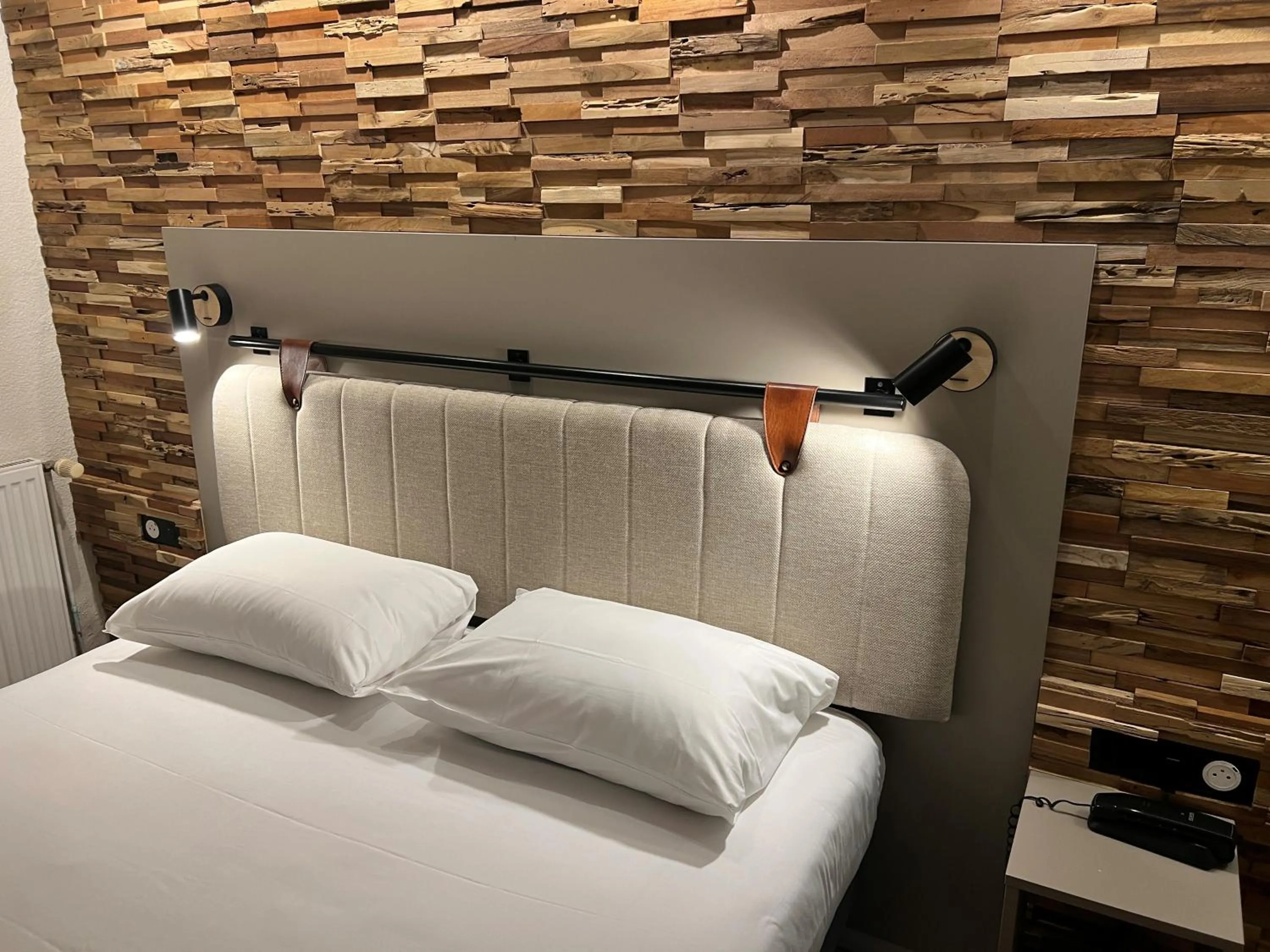 Decorative detail, Bed in Tulip Inn Beaune