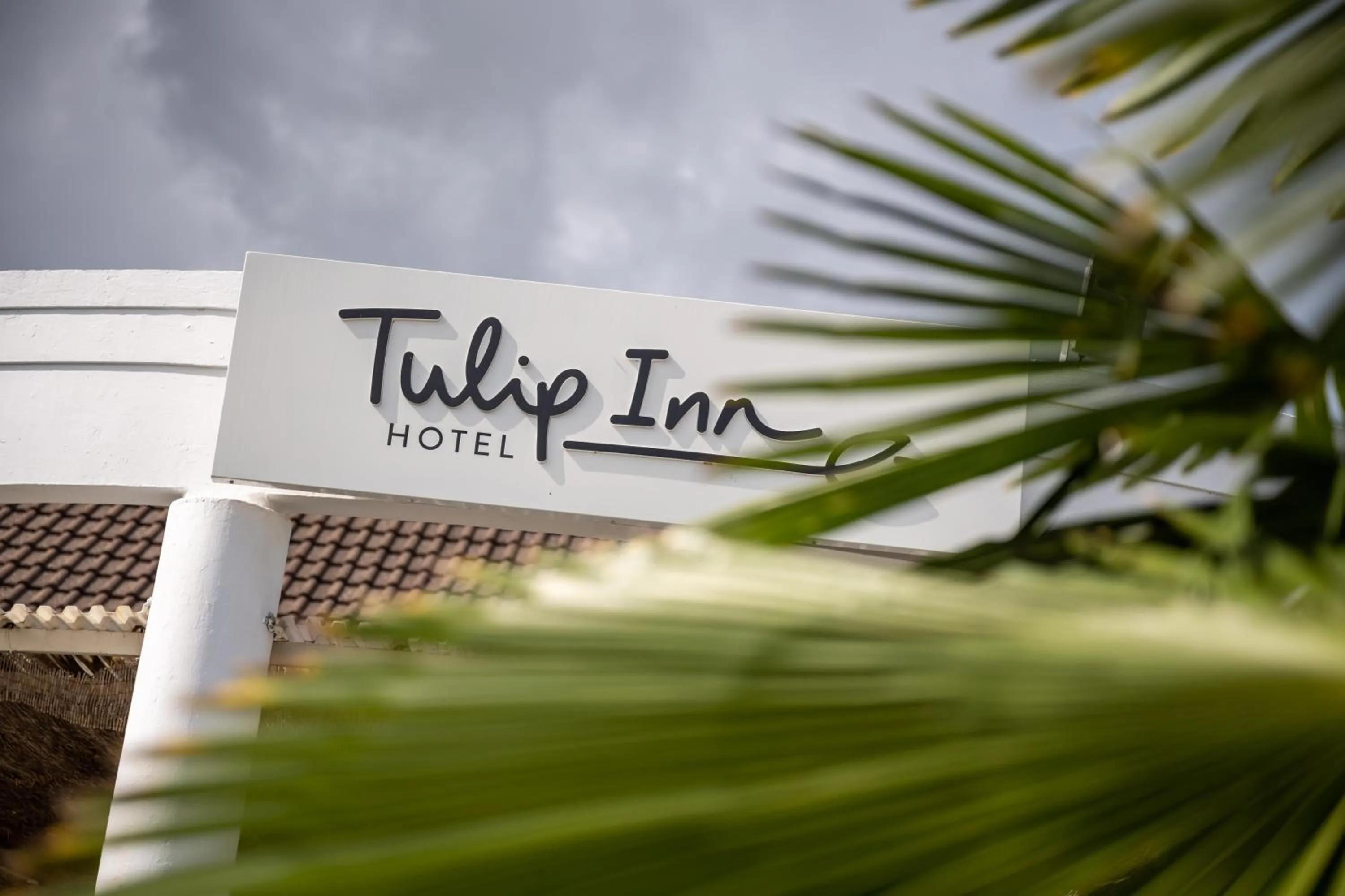 Property logo or sign in Tulip Inn Beaune