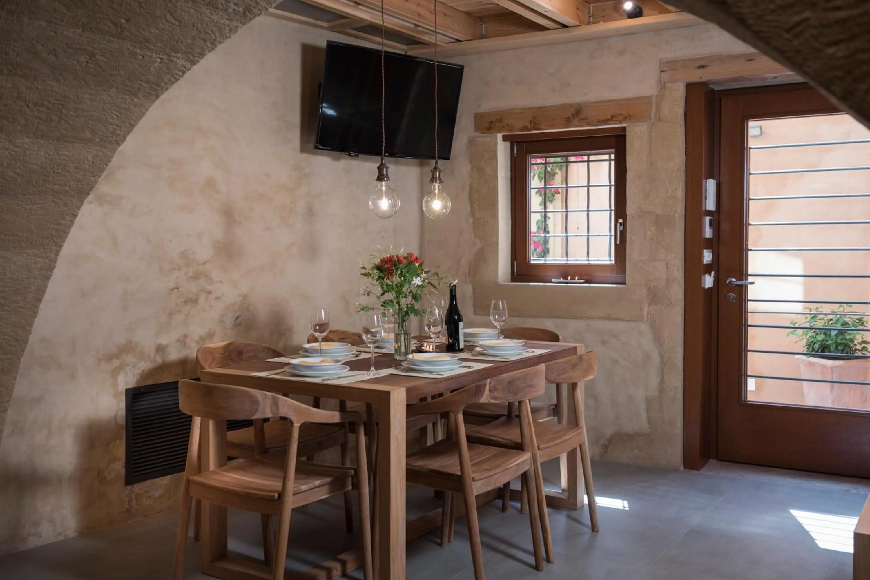Dining area in Neoria Houses