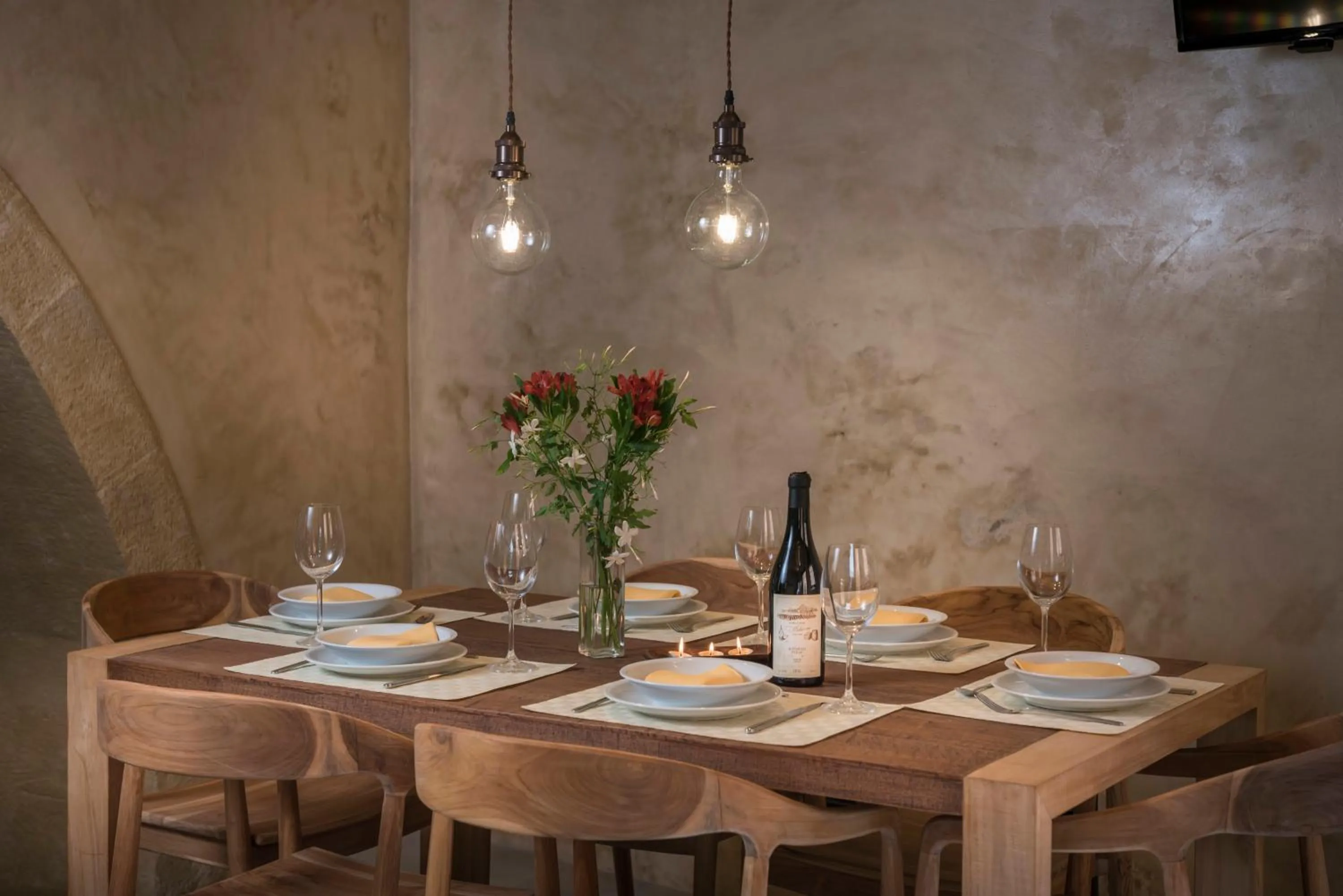 Dining area in Neoria Houses