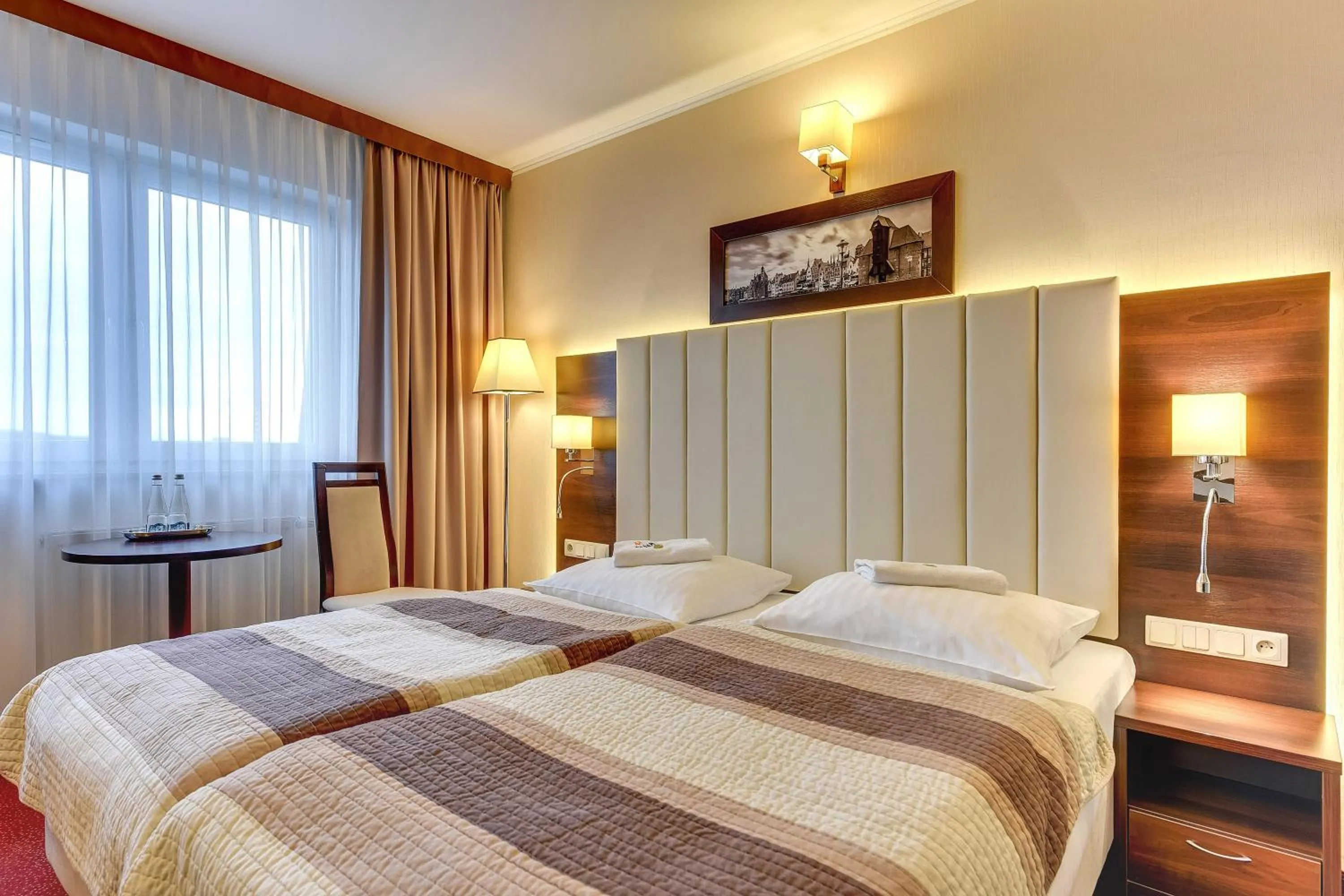 Property building, Bed in Amber Hotel