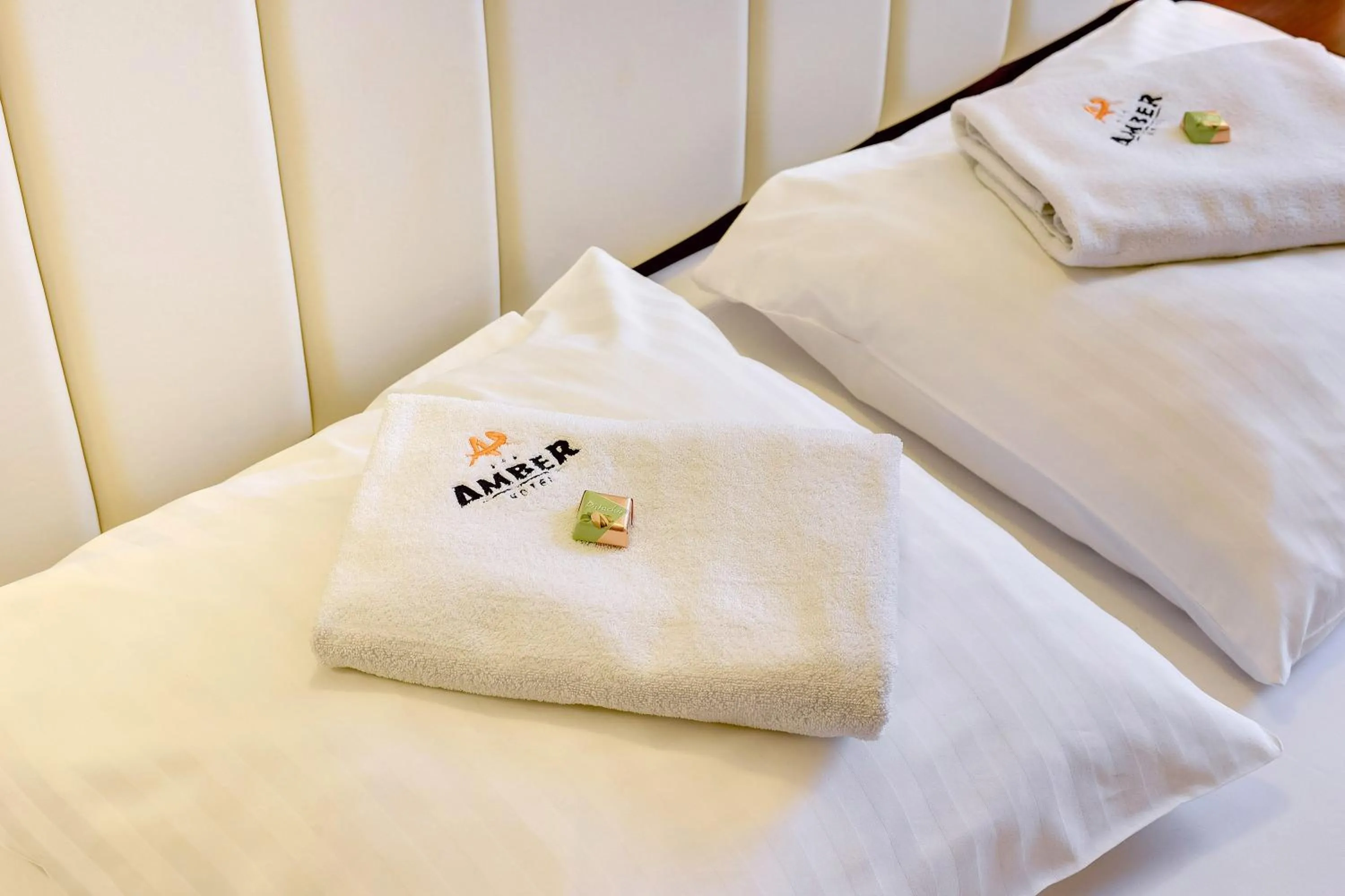 Property building, Bed in Amber Hotel