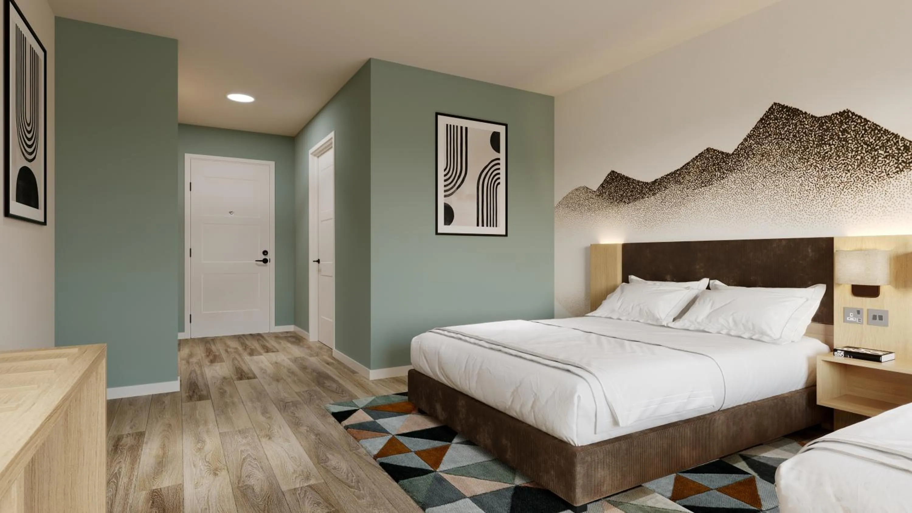 Bed in Sun & Ski Inn and Suites