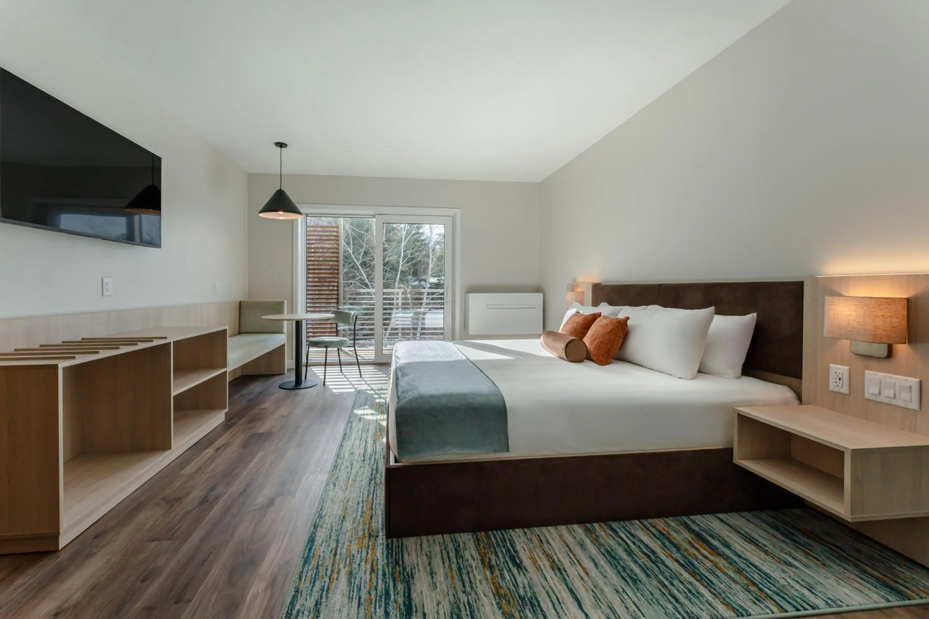 Bed in Sun & Ski Inn and Suites