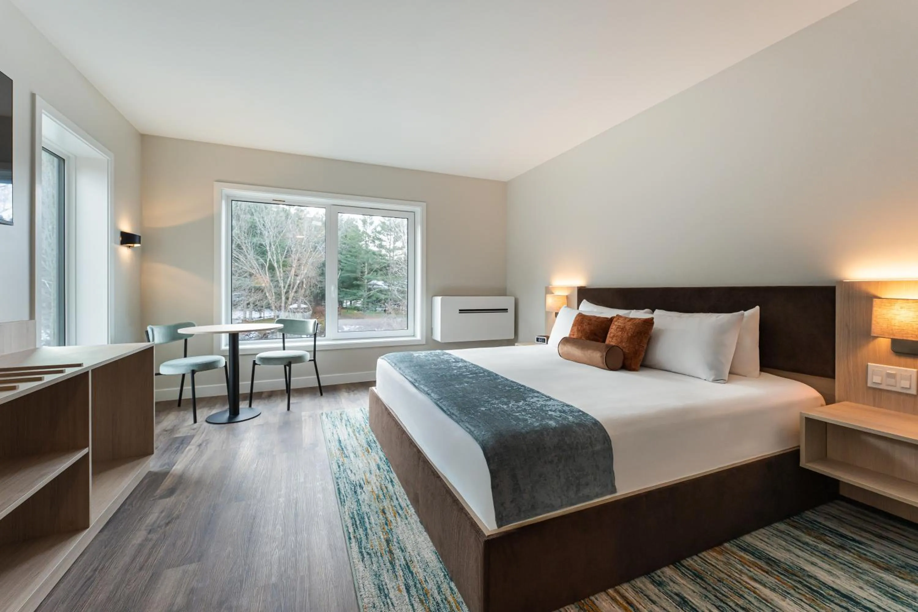 Bed in Sun & Ski Inn and Suites