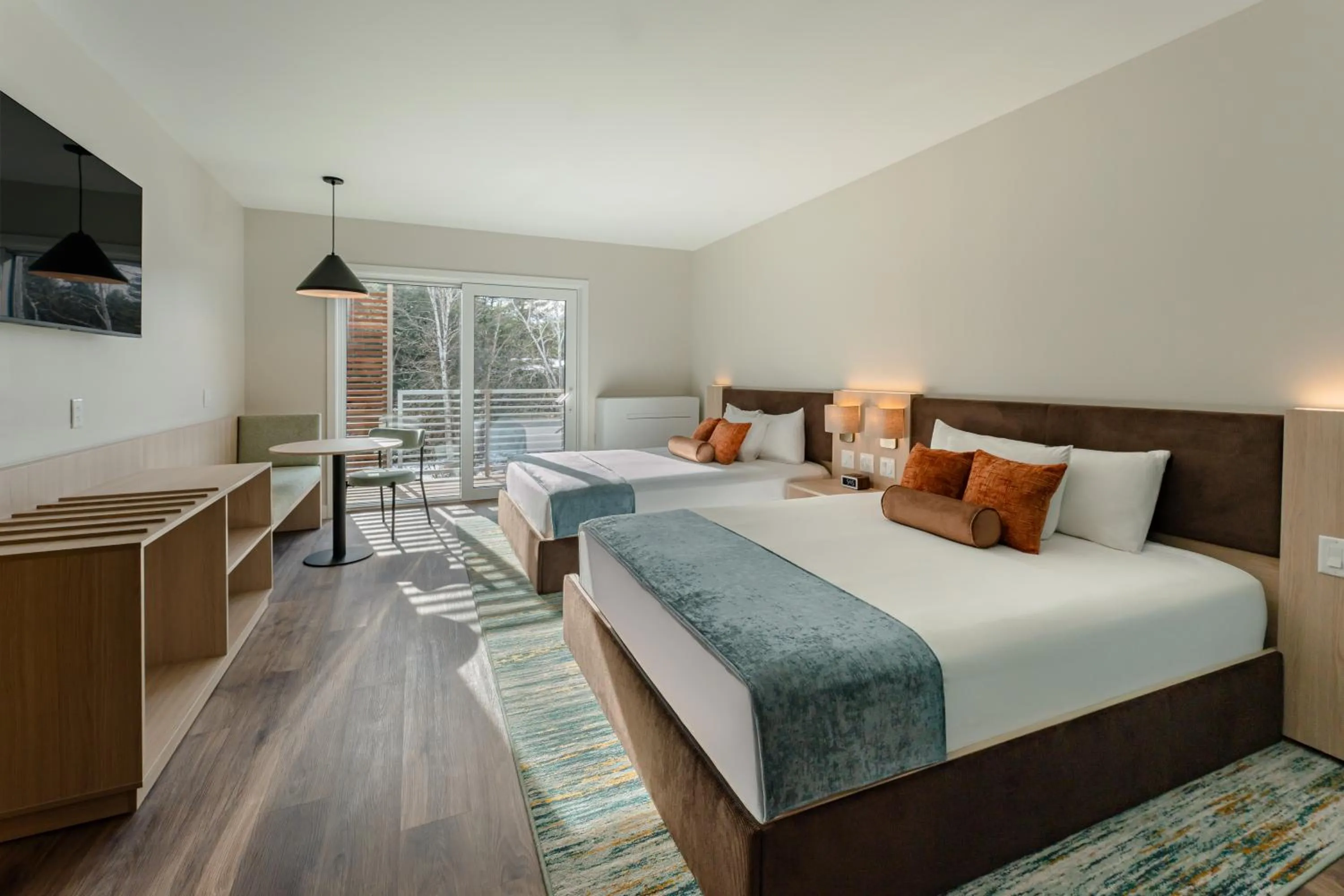 Bed in Sun & Ski Inn and Suites