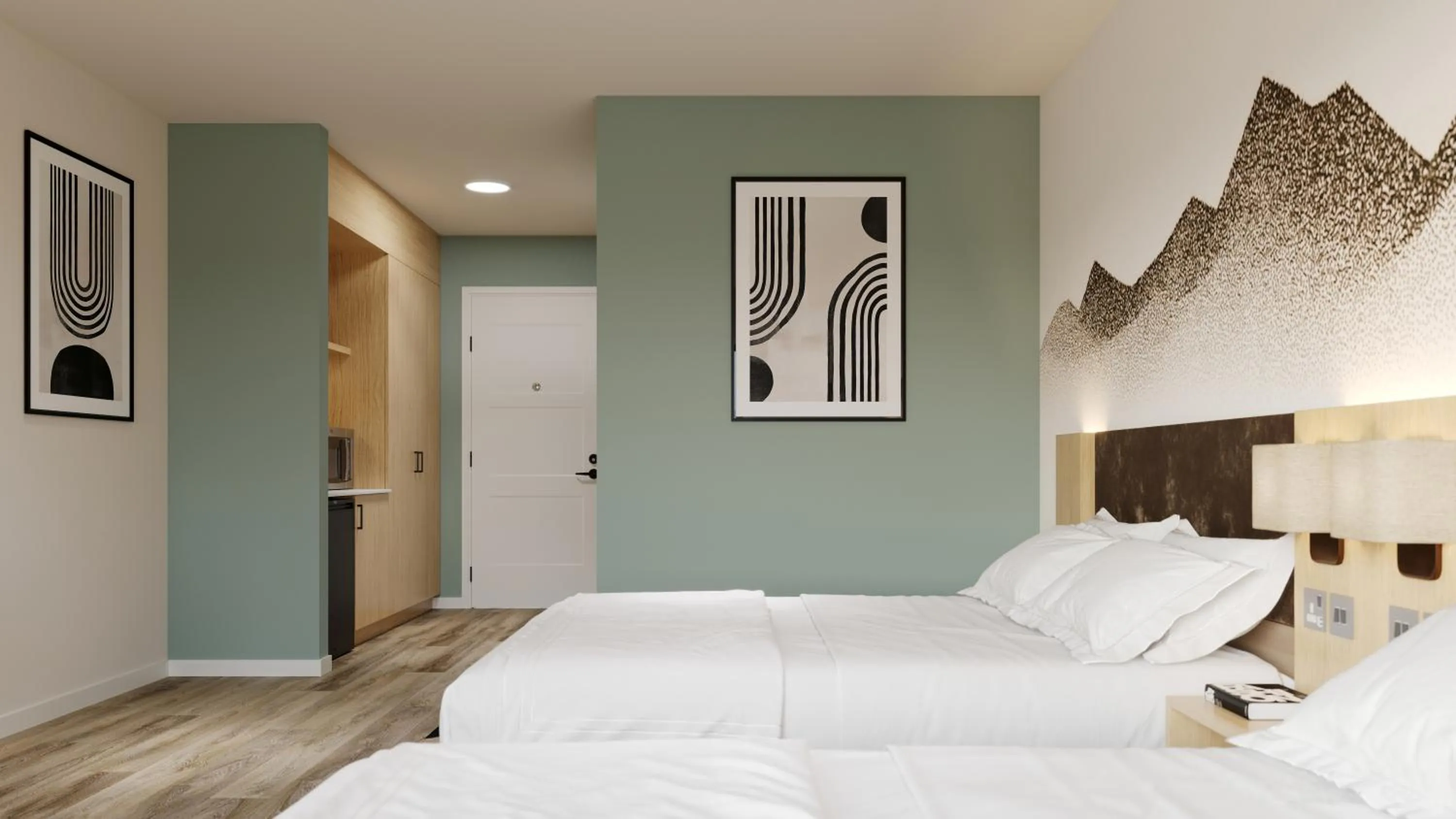 Bed in Sun & Ski Inn and Suites