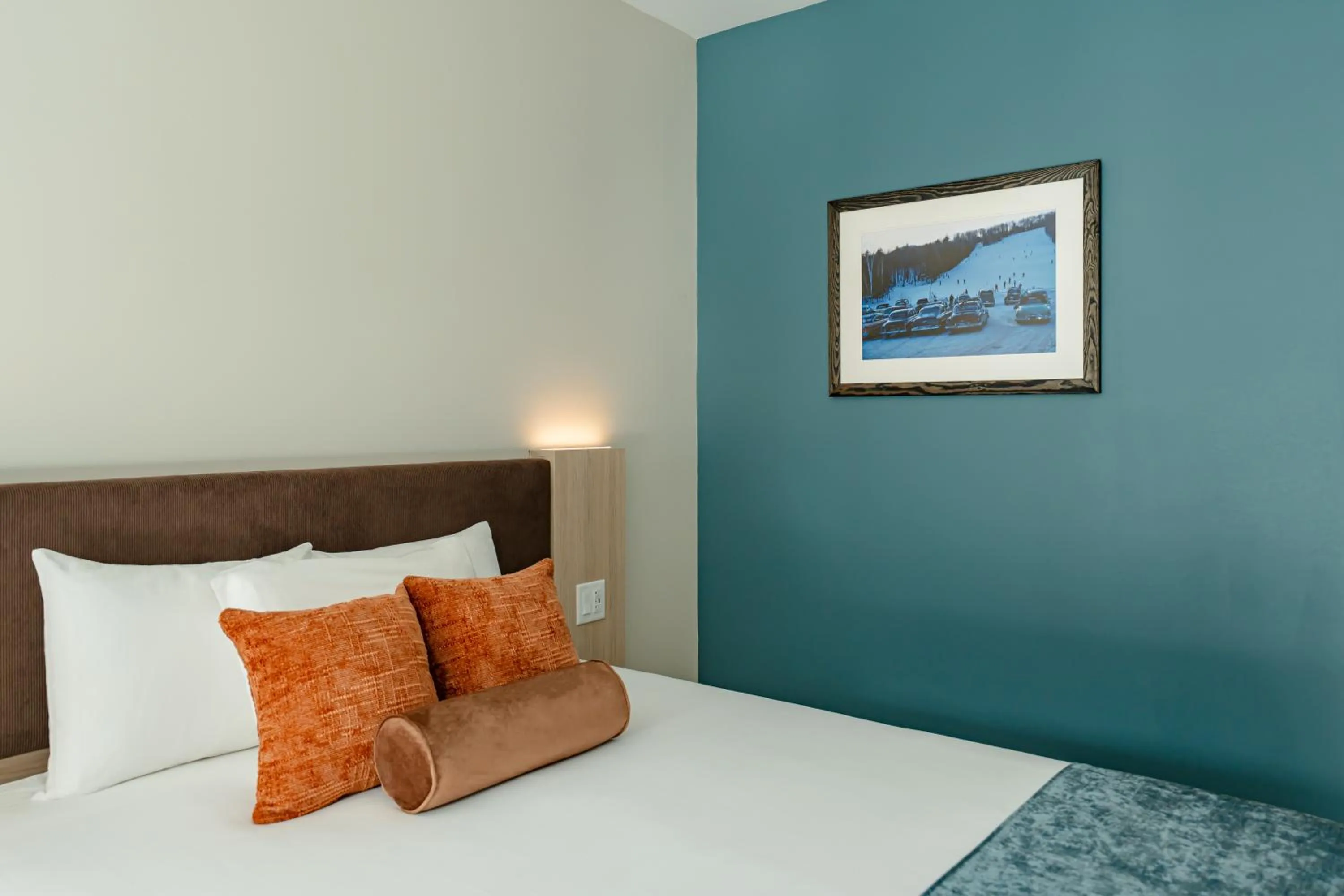 Bed in Sun & Ski Inn and Suites