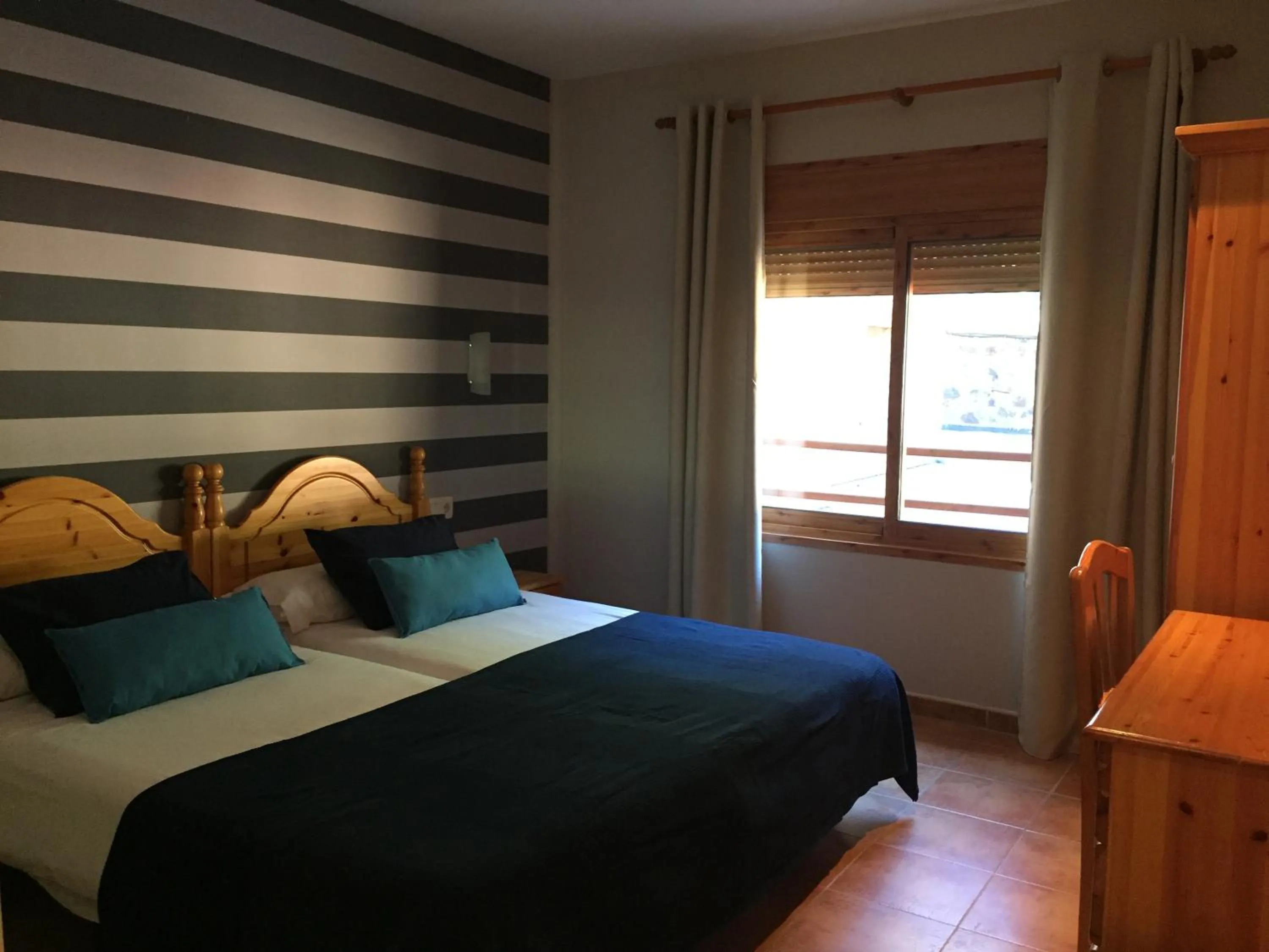 Decorative detail, Bed in Hotel Supermolina