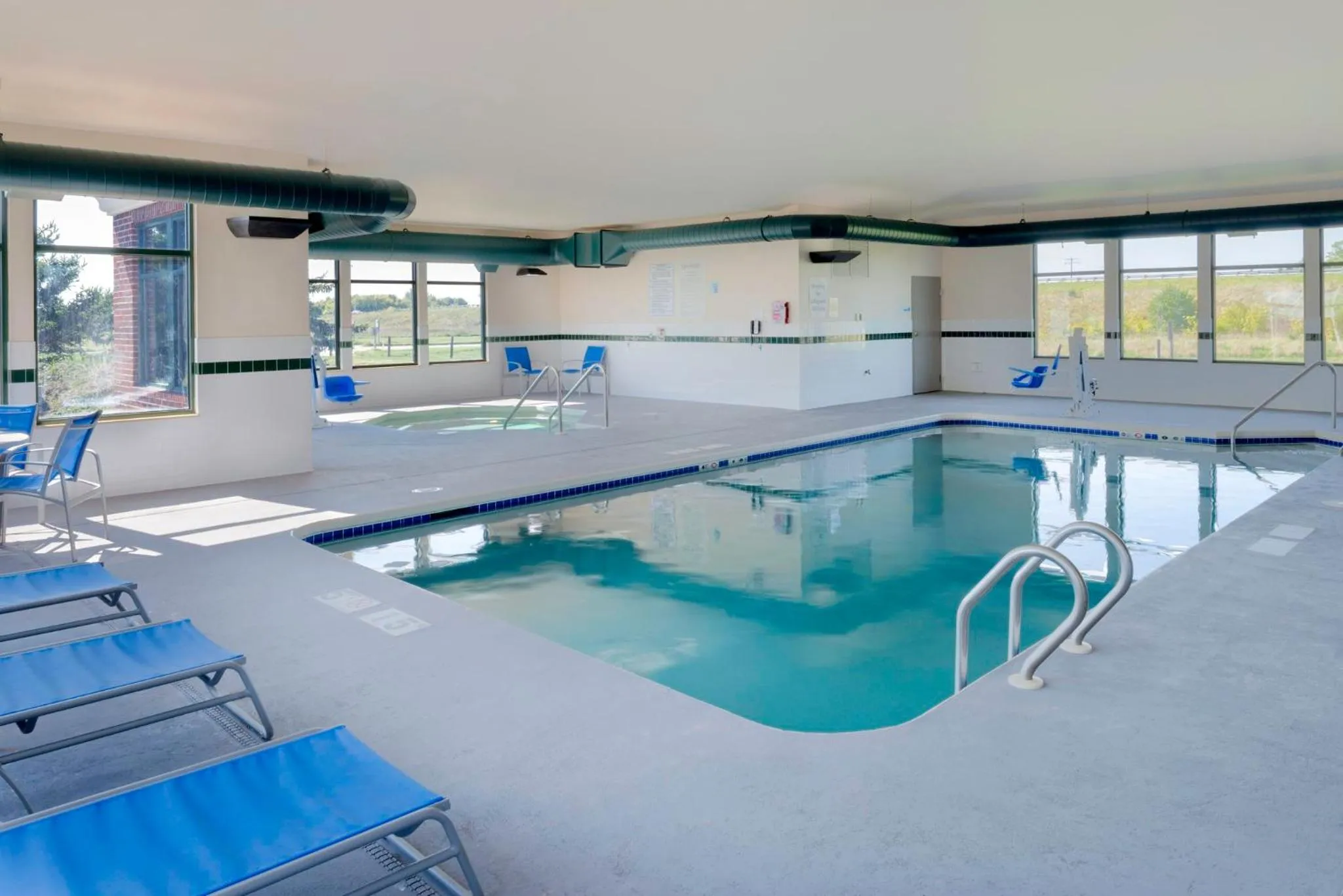 Swimming pool in Holiday Inn Express Hotel & Suites Fort Atkinson by IHG