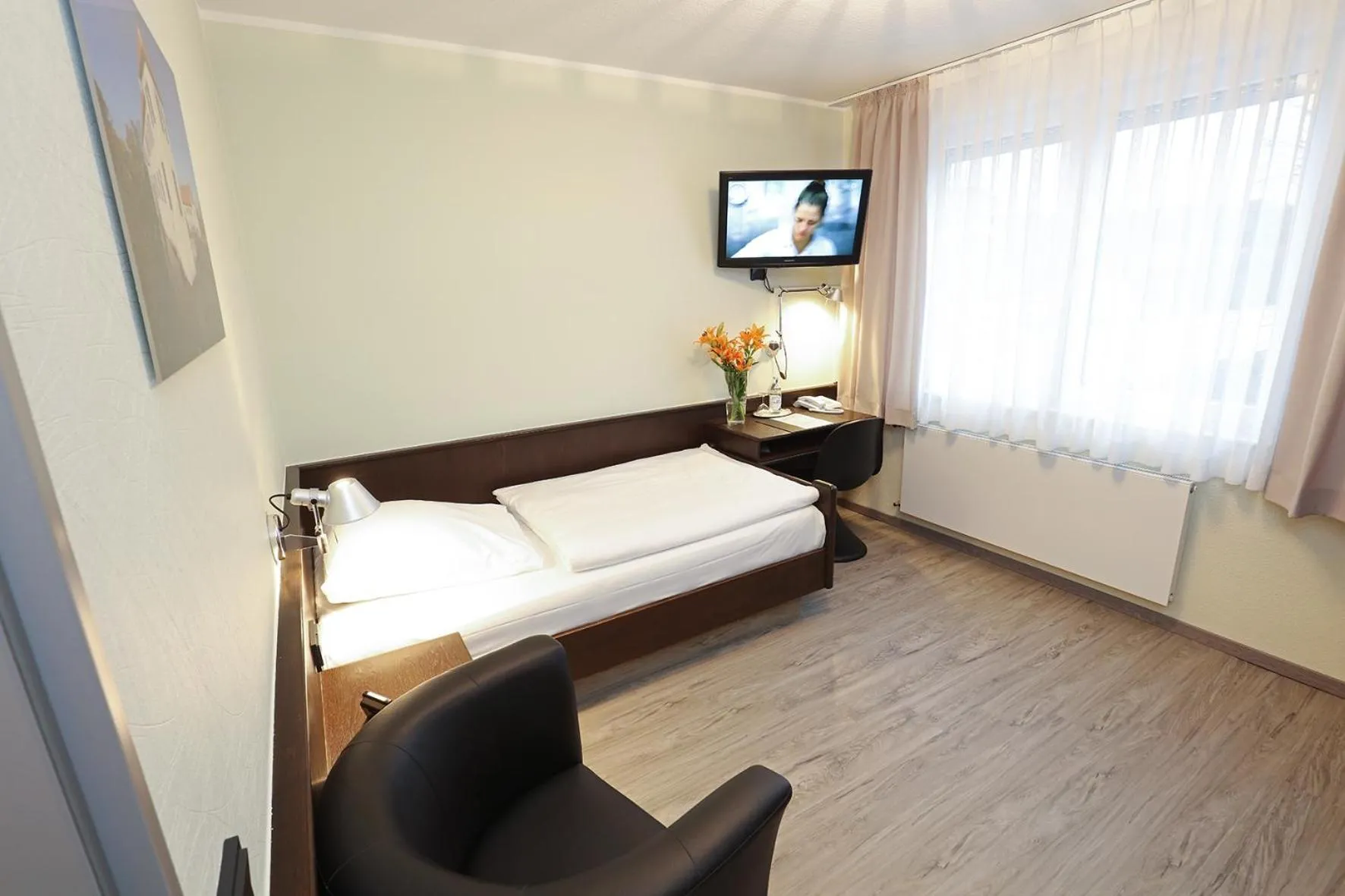 Photo of the whole room, Bed in Hotel Kröger