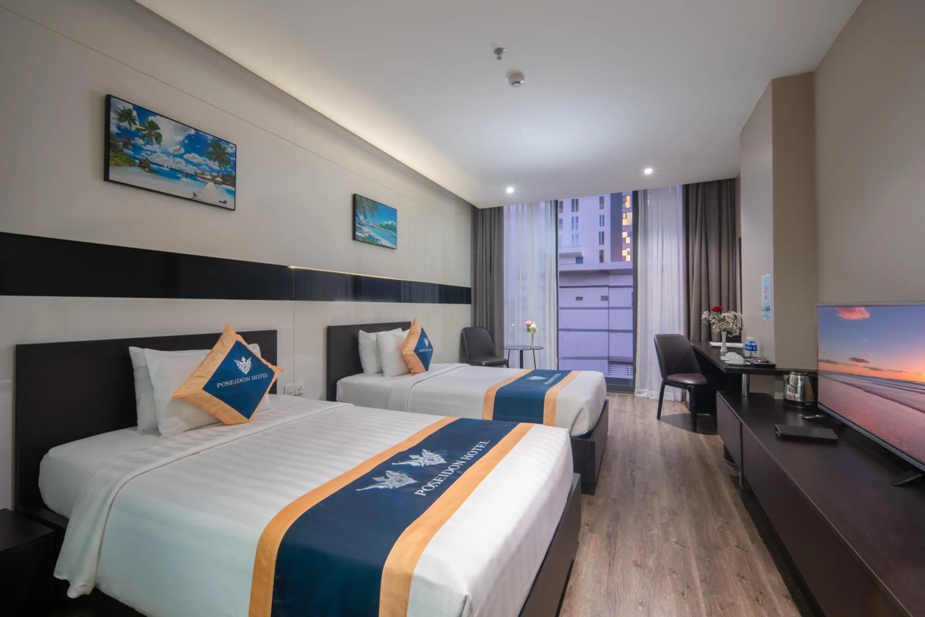 Bed in Poseidon Nha Trang Hotel