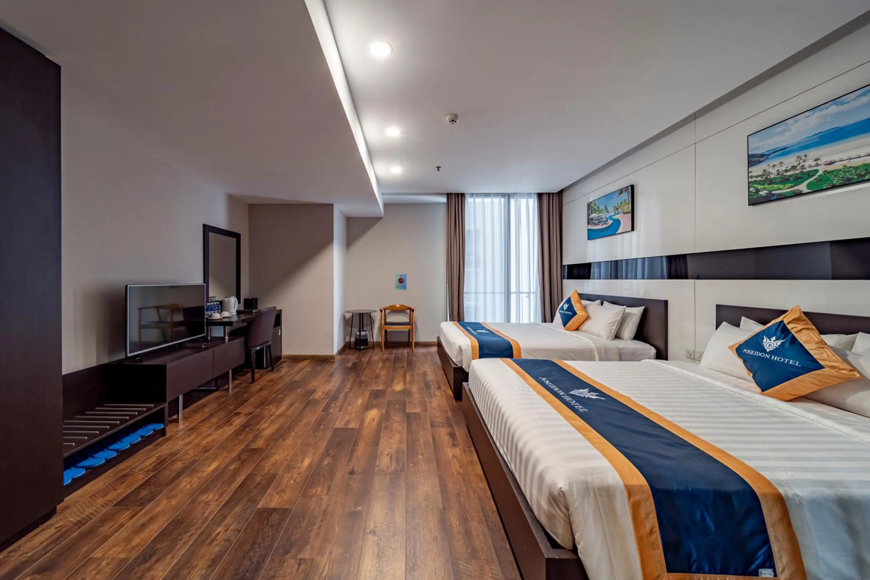 Bed in Poseidon Nha Trang Hotel