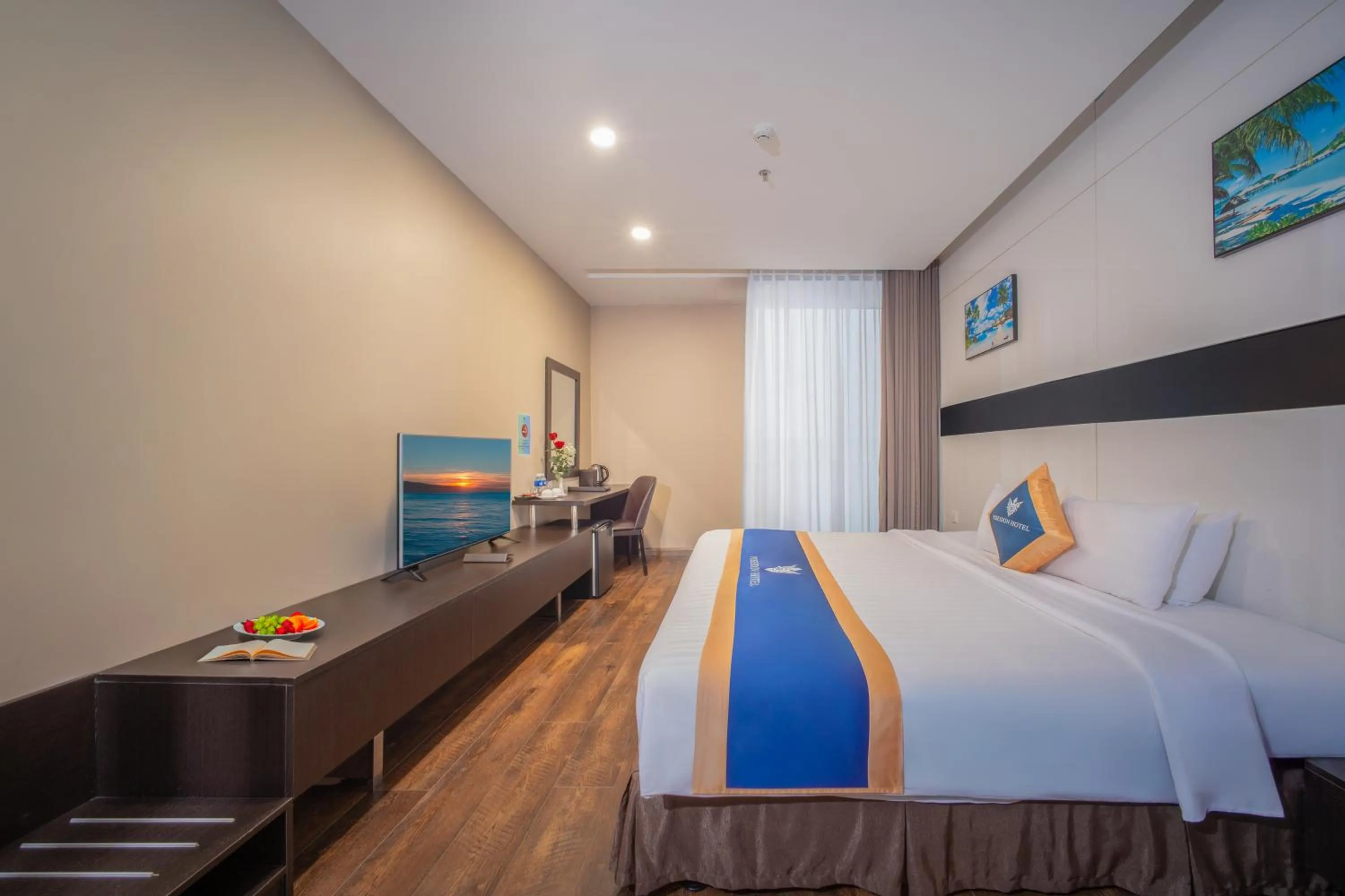 Bed in Poseidon Nha Trang Hotel