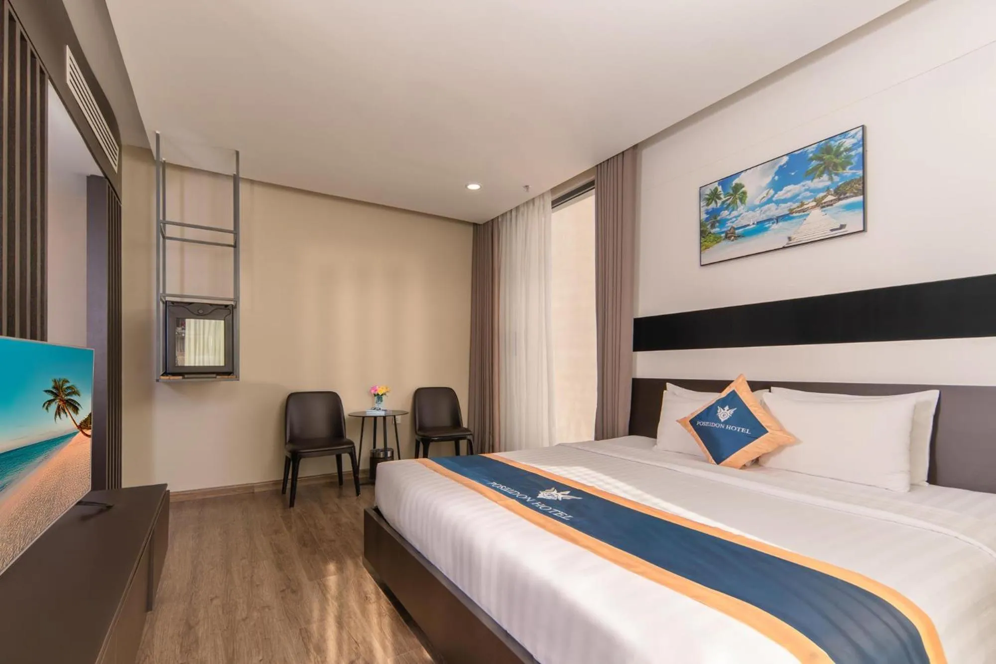 Photo of the whole room, Bed in Poseidon Nha Trang Hotel