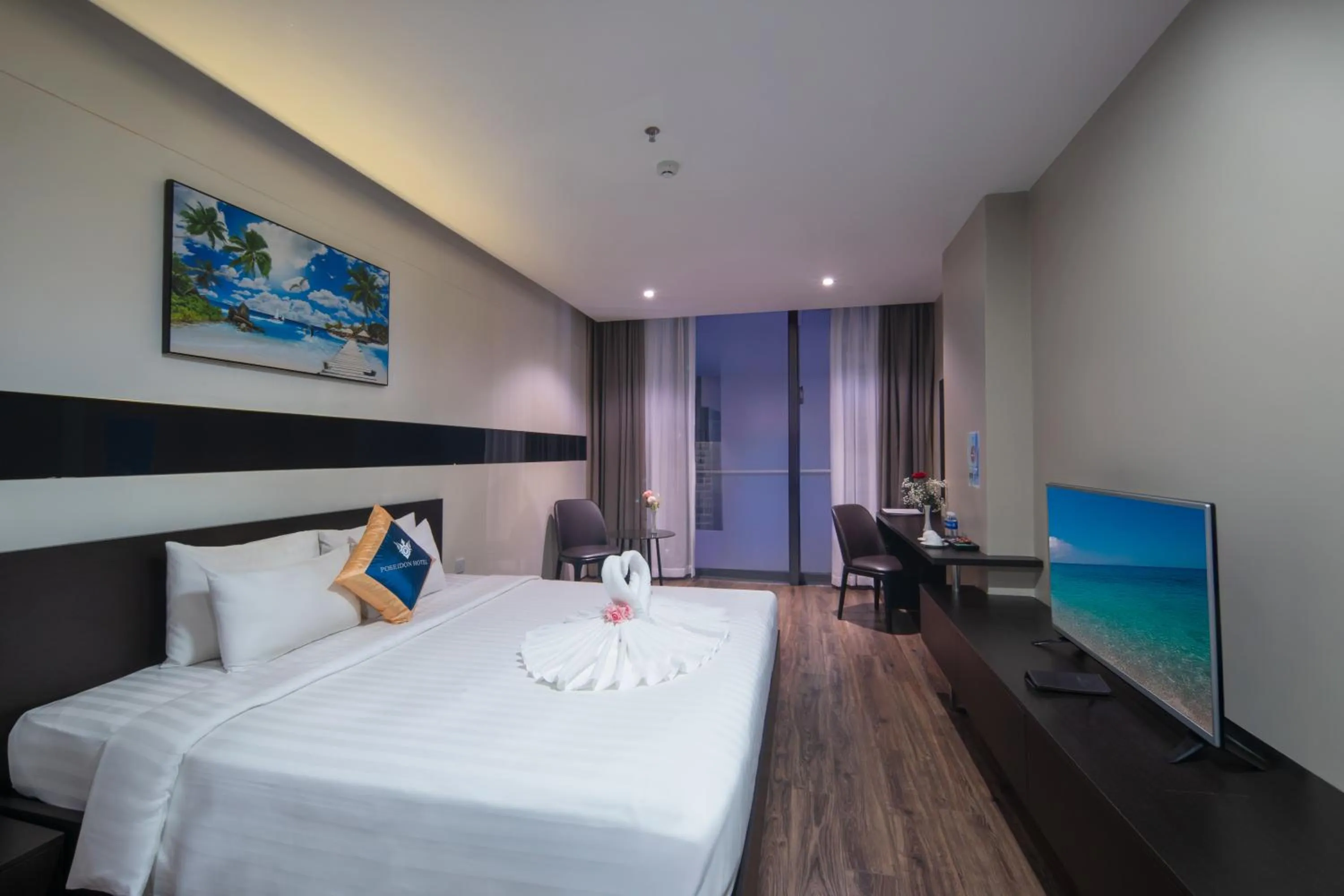 Bed in Poseidon Nha Trang Hotel
