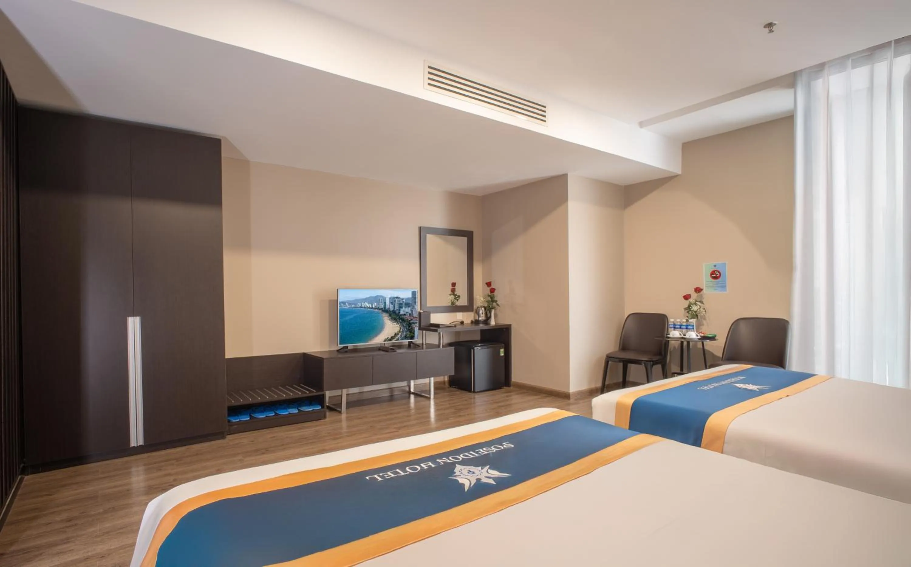 Photo of the whole room, Bed in Poseidon Nha Trang Hotel