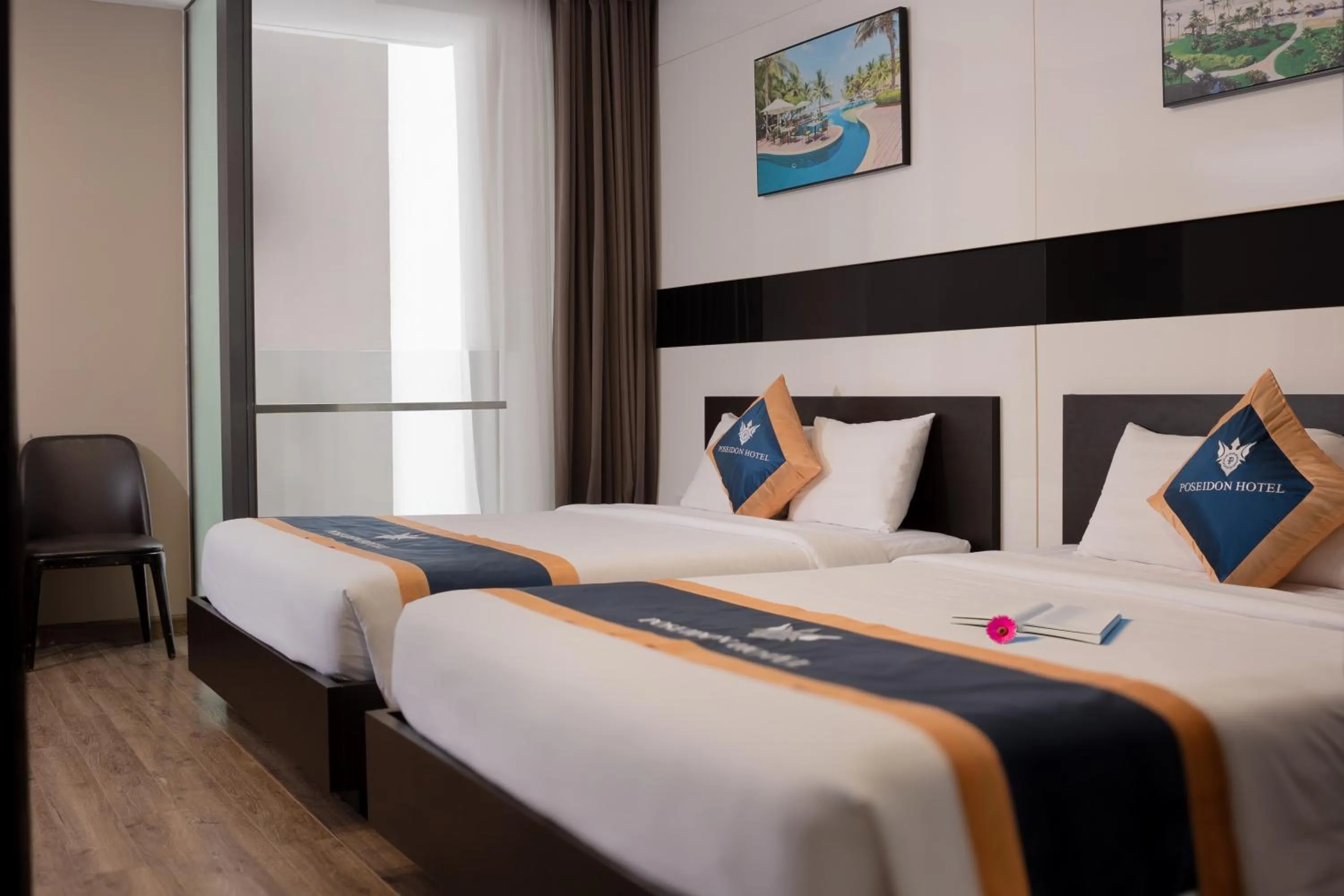 Bed in Poseidon Nha Trang Hotel