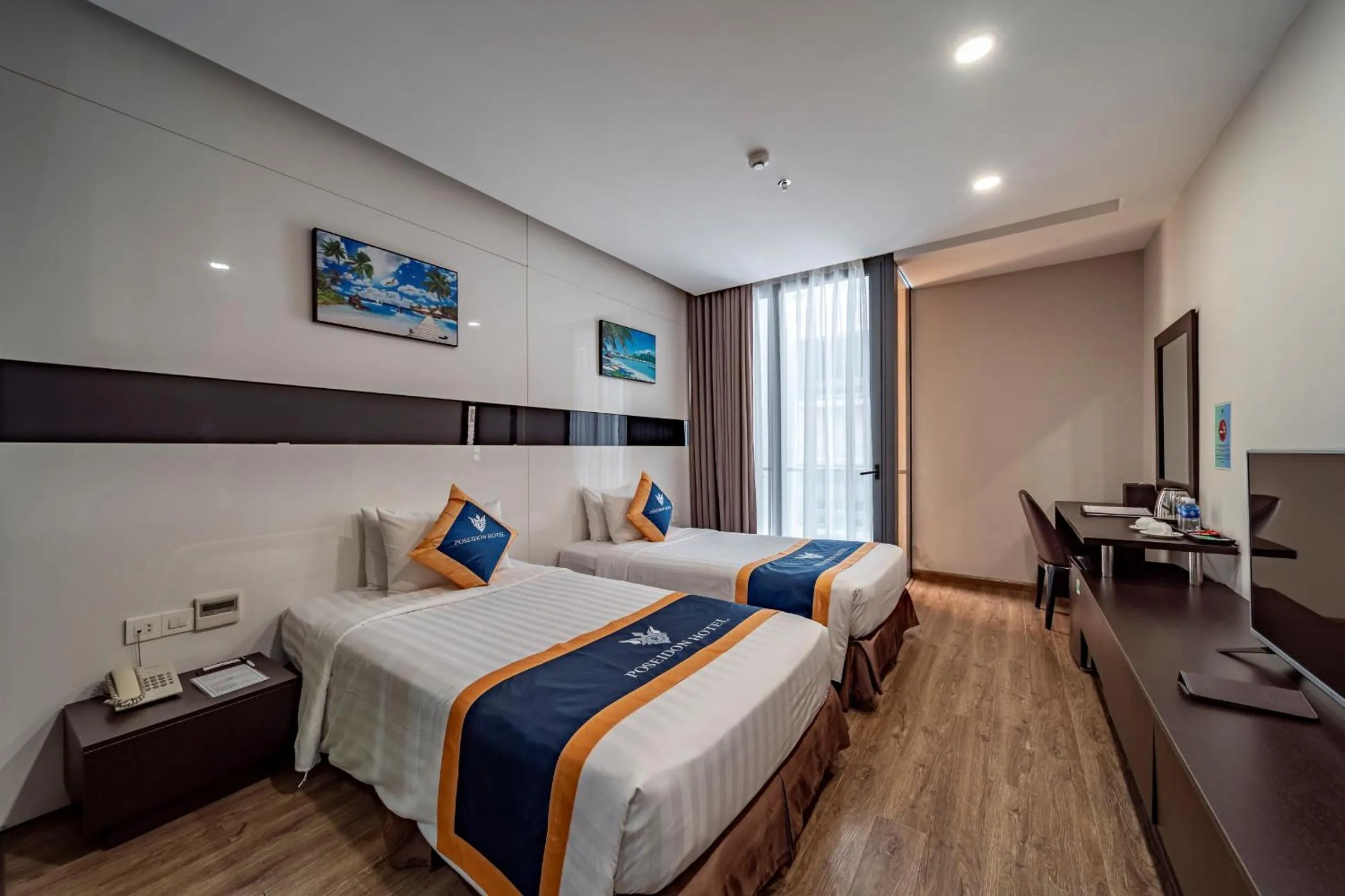 Bed in Poseidon Nha Trang Hotel