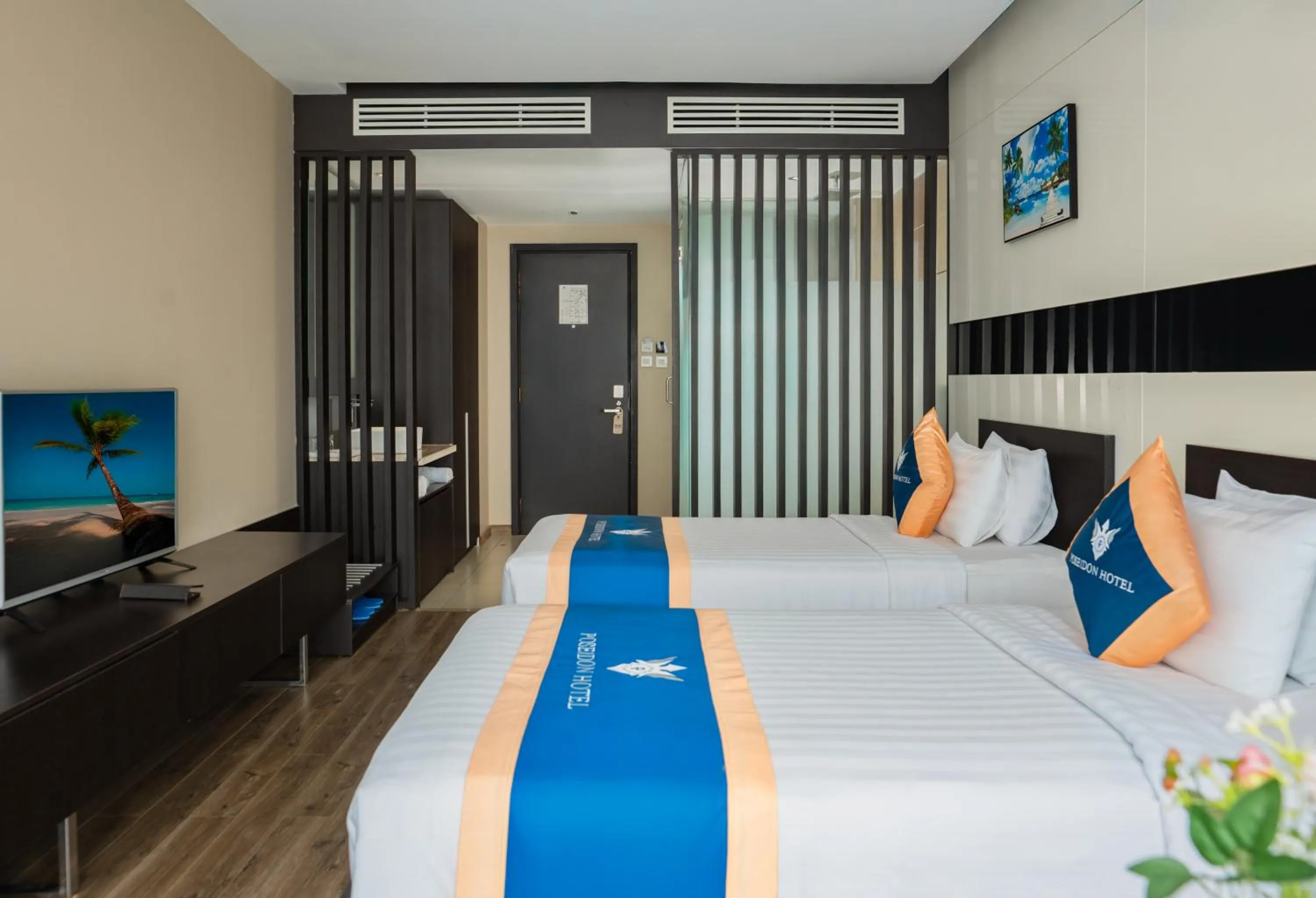 Bed in Poseidon Nha Trang Hotel