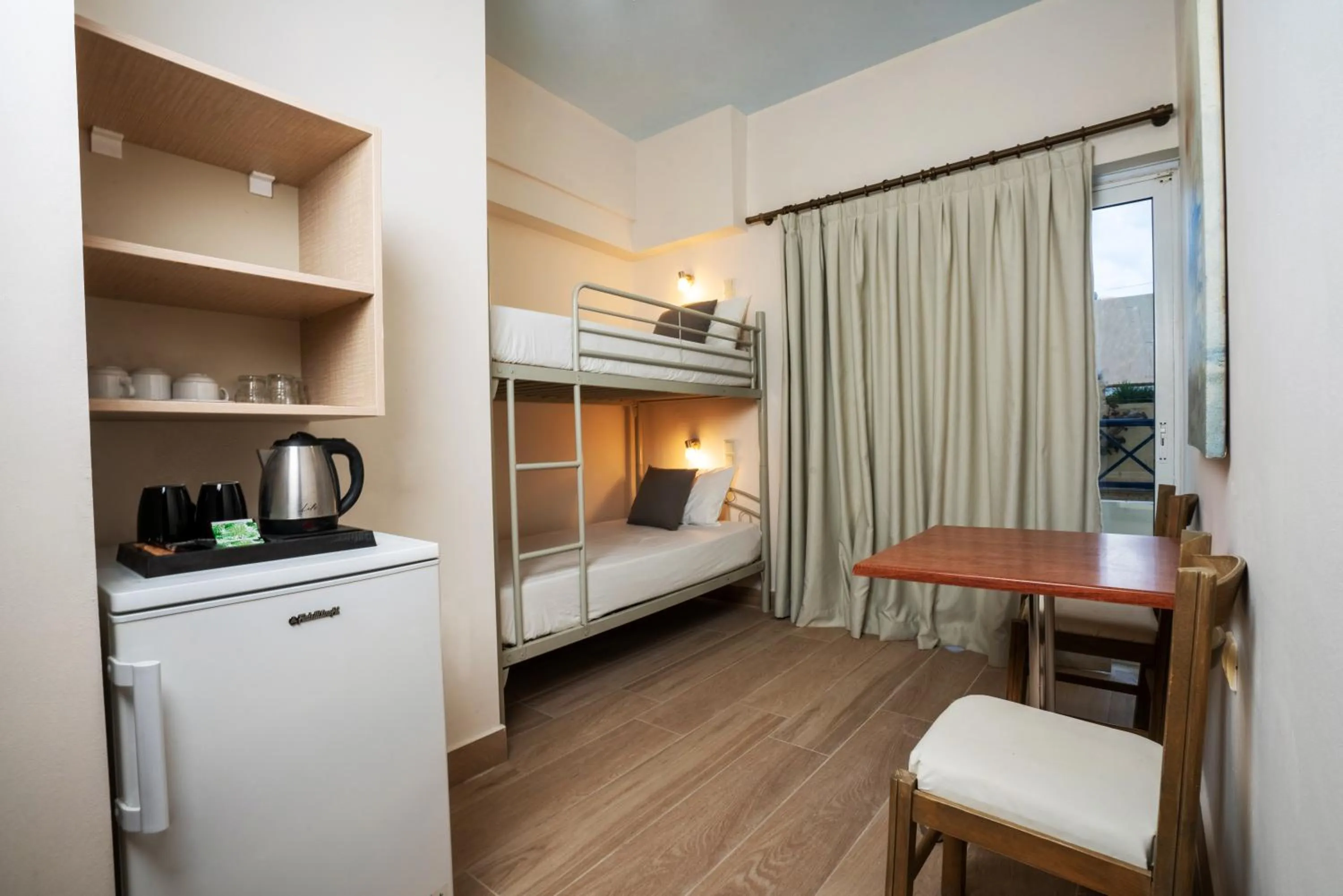 Living room, Bed in Philoxenia Hotel & SPA