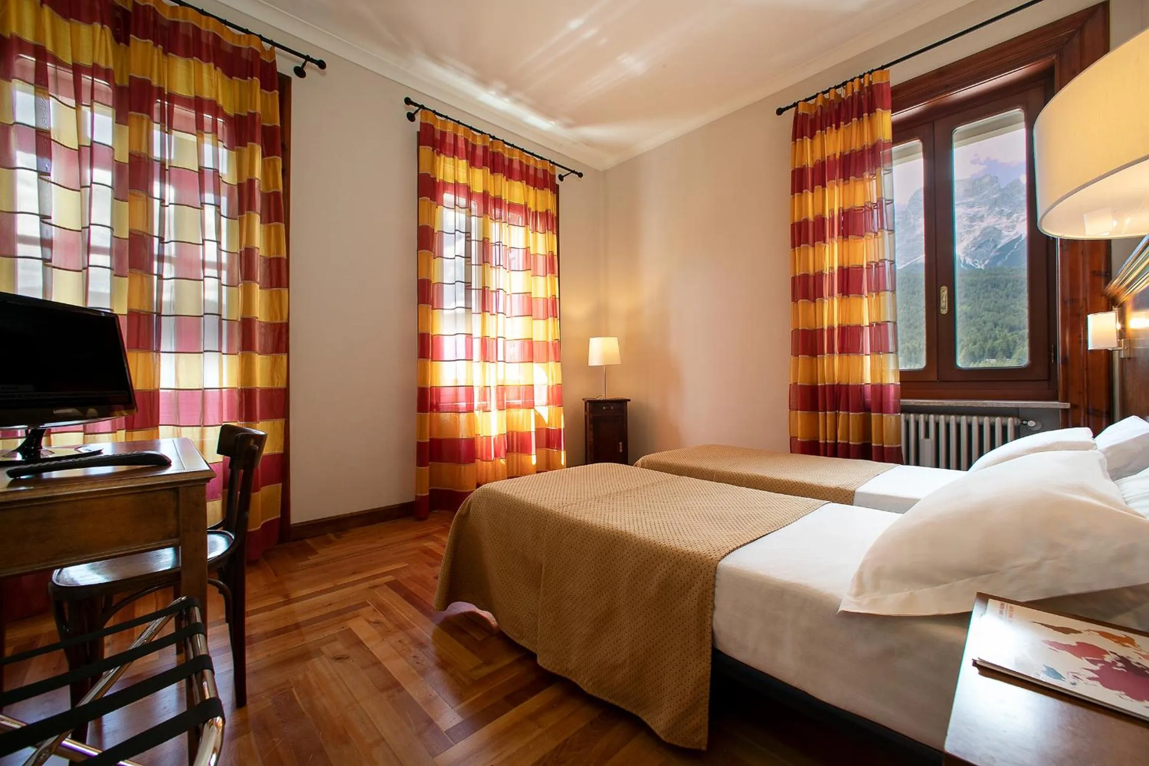 Photo of the whole room, Bed in TH Borca di Cadore - Park Hotel Des Dolomites