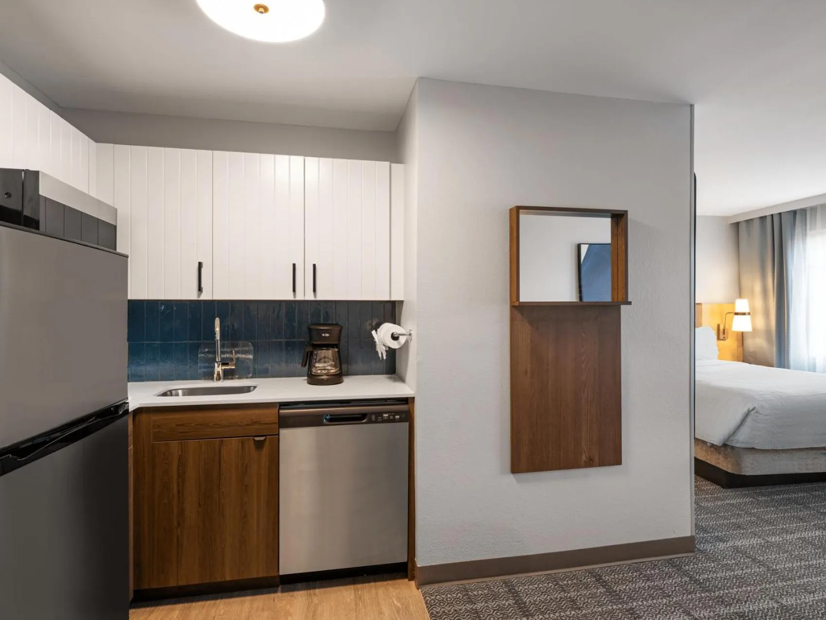 Kitchen or kitchenette, Bed in Staybridge Suites Rochester University by IHG