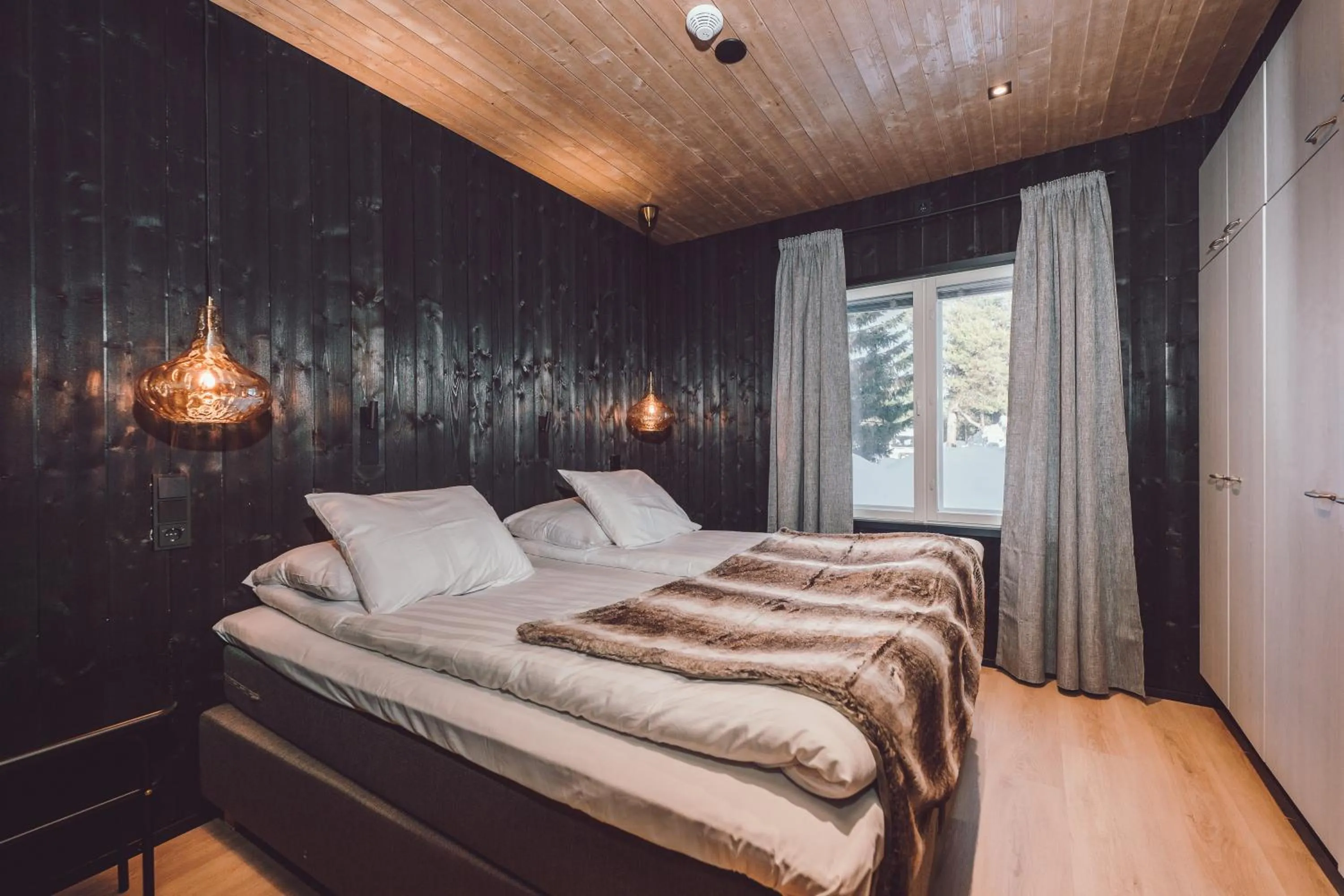 Bed in Wilderness Hotel Juutua