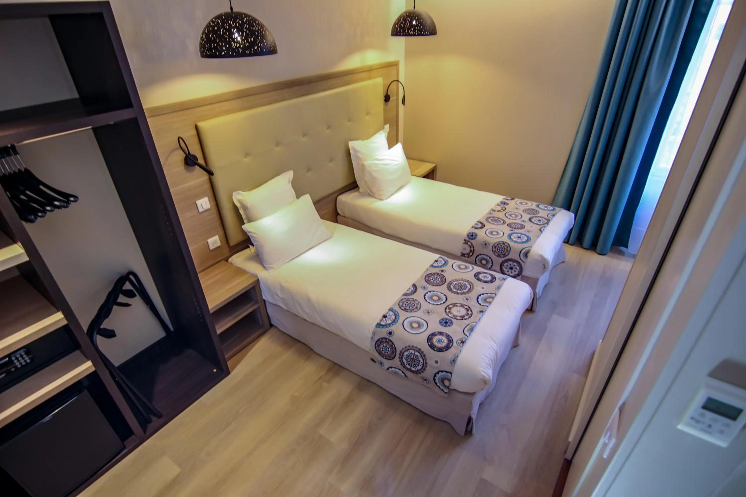 Photo of the whole room, Bed in Hôtel Montaigne