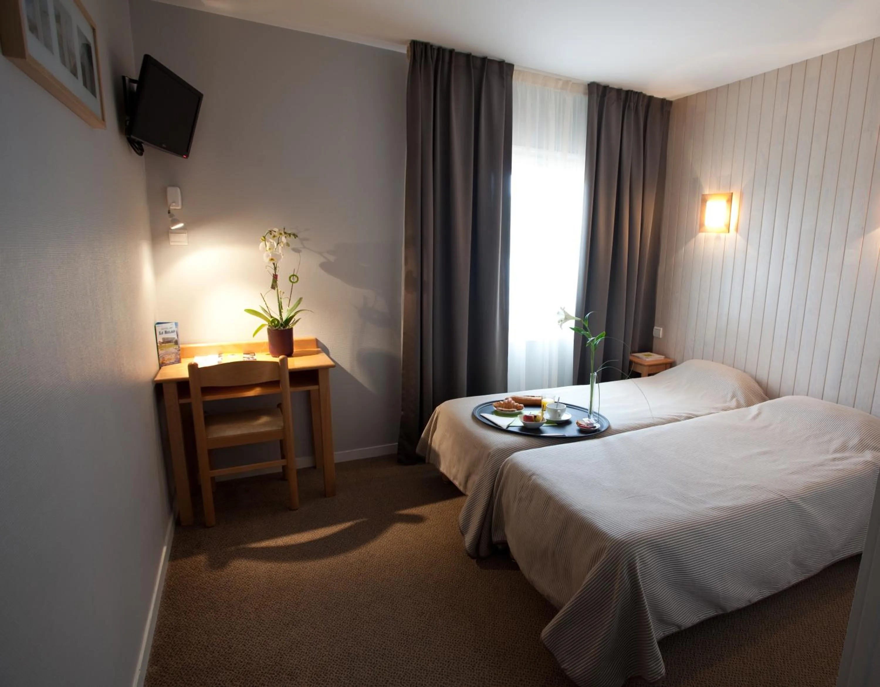 Photo of the whole room, Bed in Logis Hôtel Le Relais