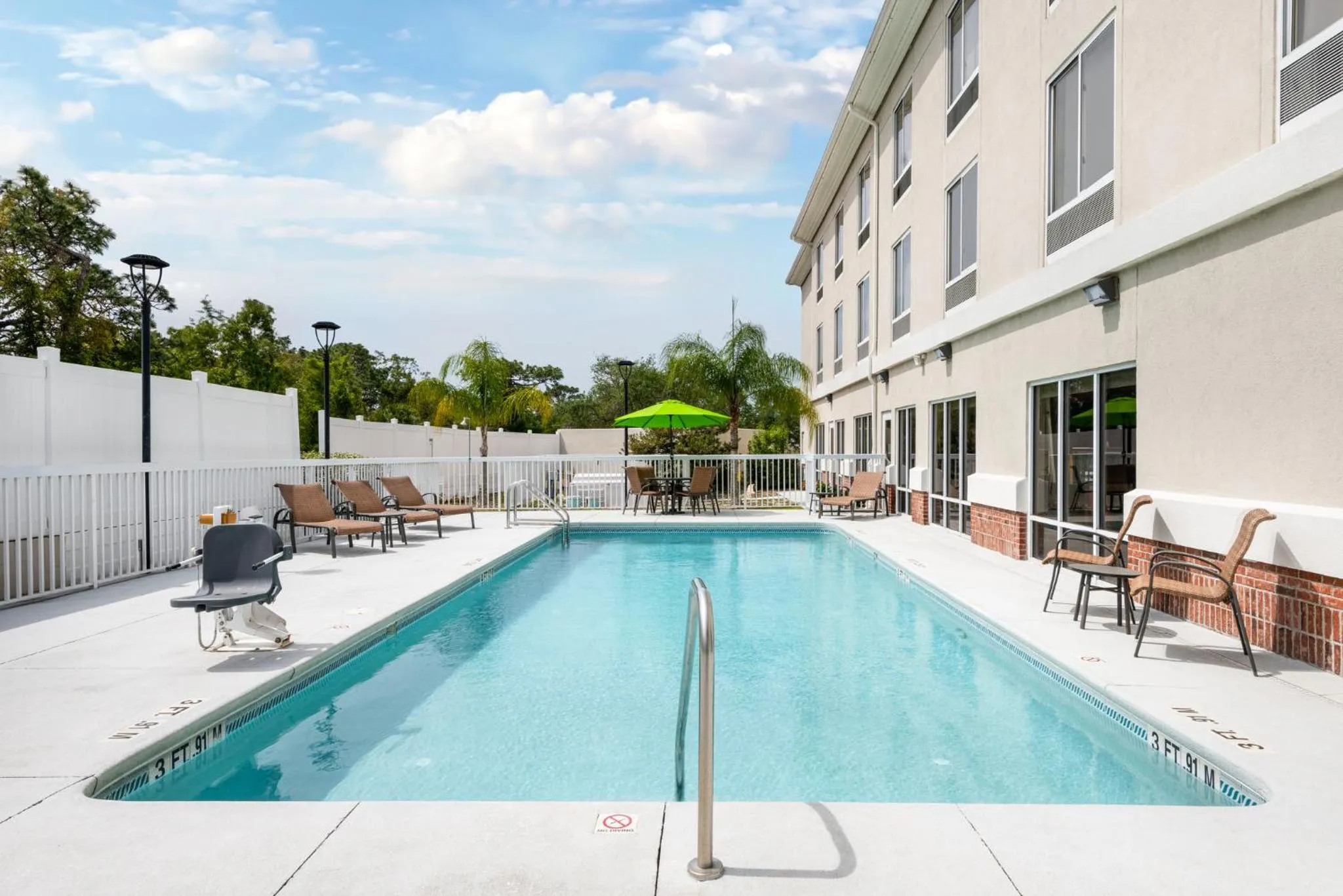 Swimming pool in Holiday Inn Express & Suites Spring Hill by IHG