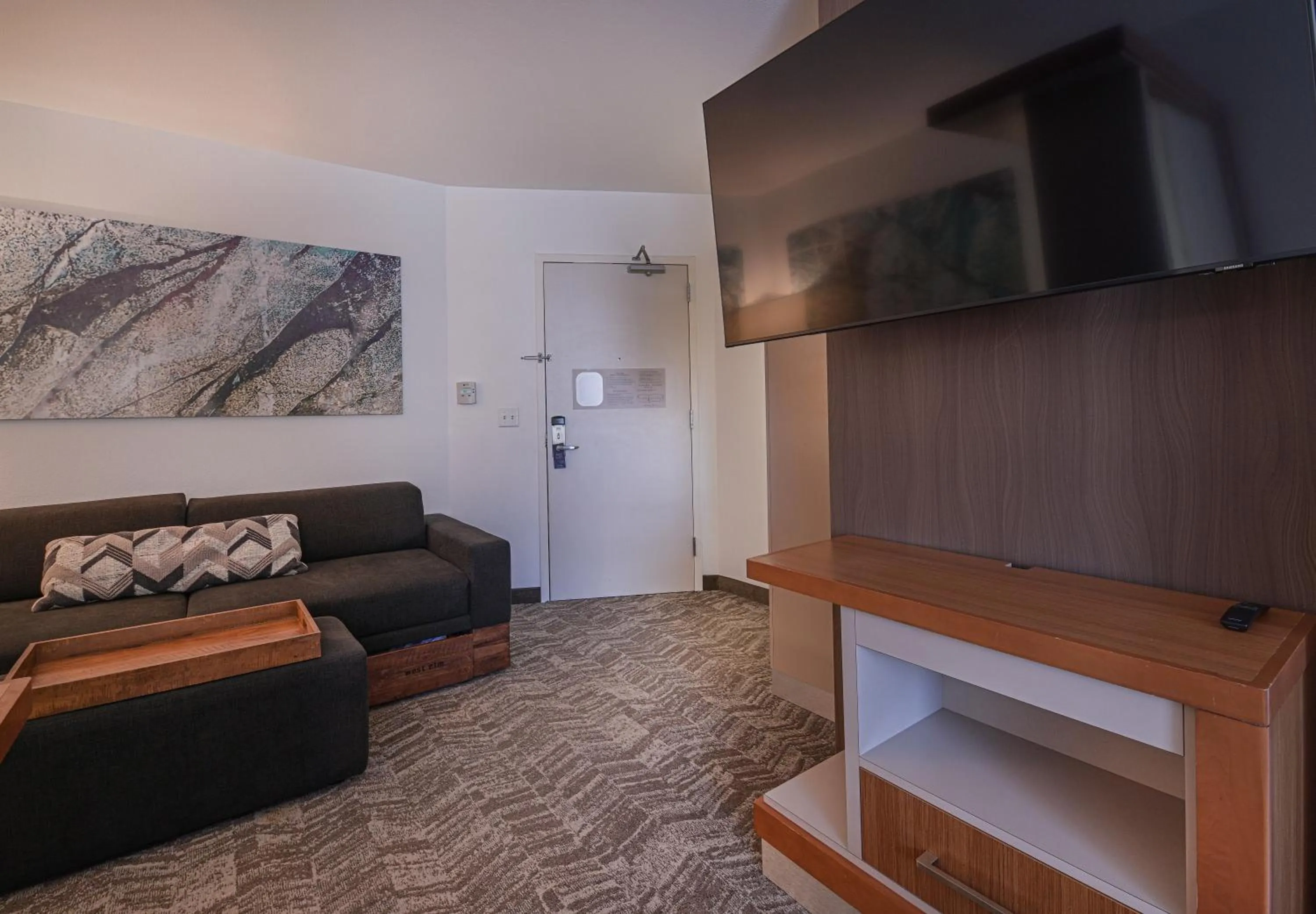 Communal lounge/ TV room in SpringHill Suites by Marriott Grand Forks