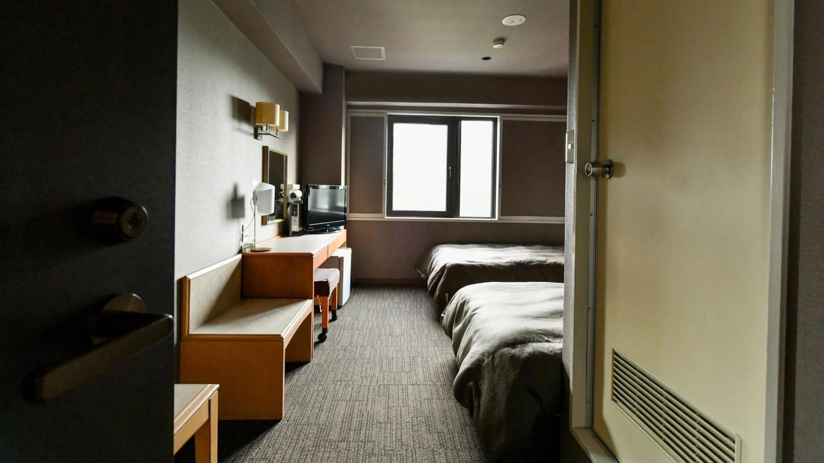 Photo of the whole room, Bed in Okazaki Daiichi Hotel