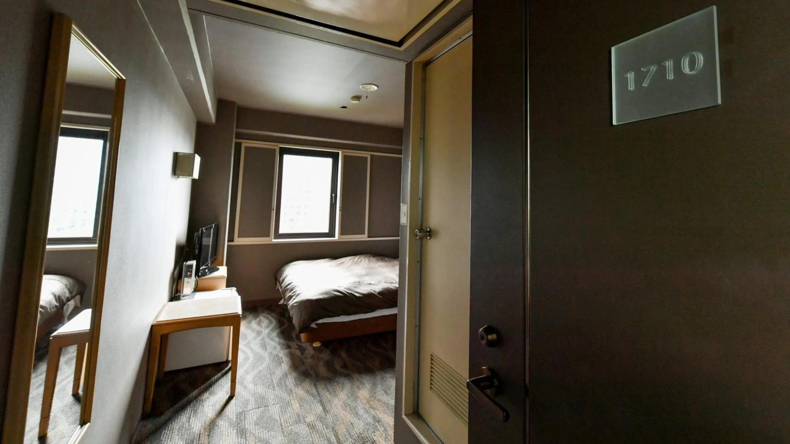 Photo of the whole room, Bed in Okazaki Daiichi Hotel