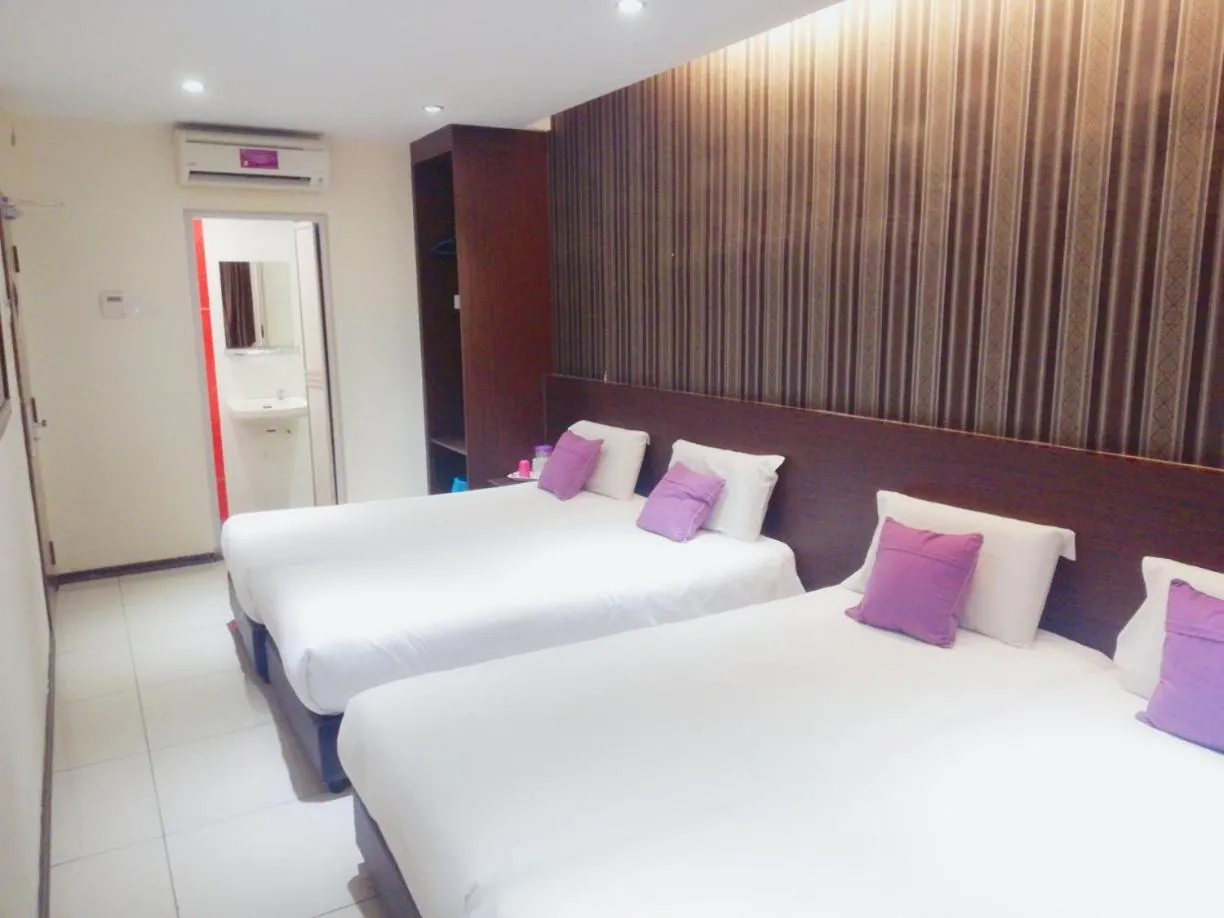Bed in Remember Hotel Bukit Gambir