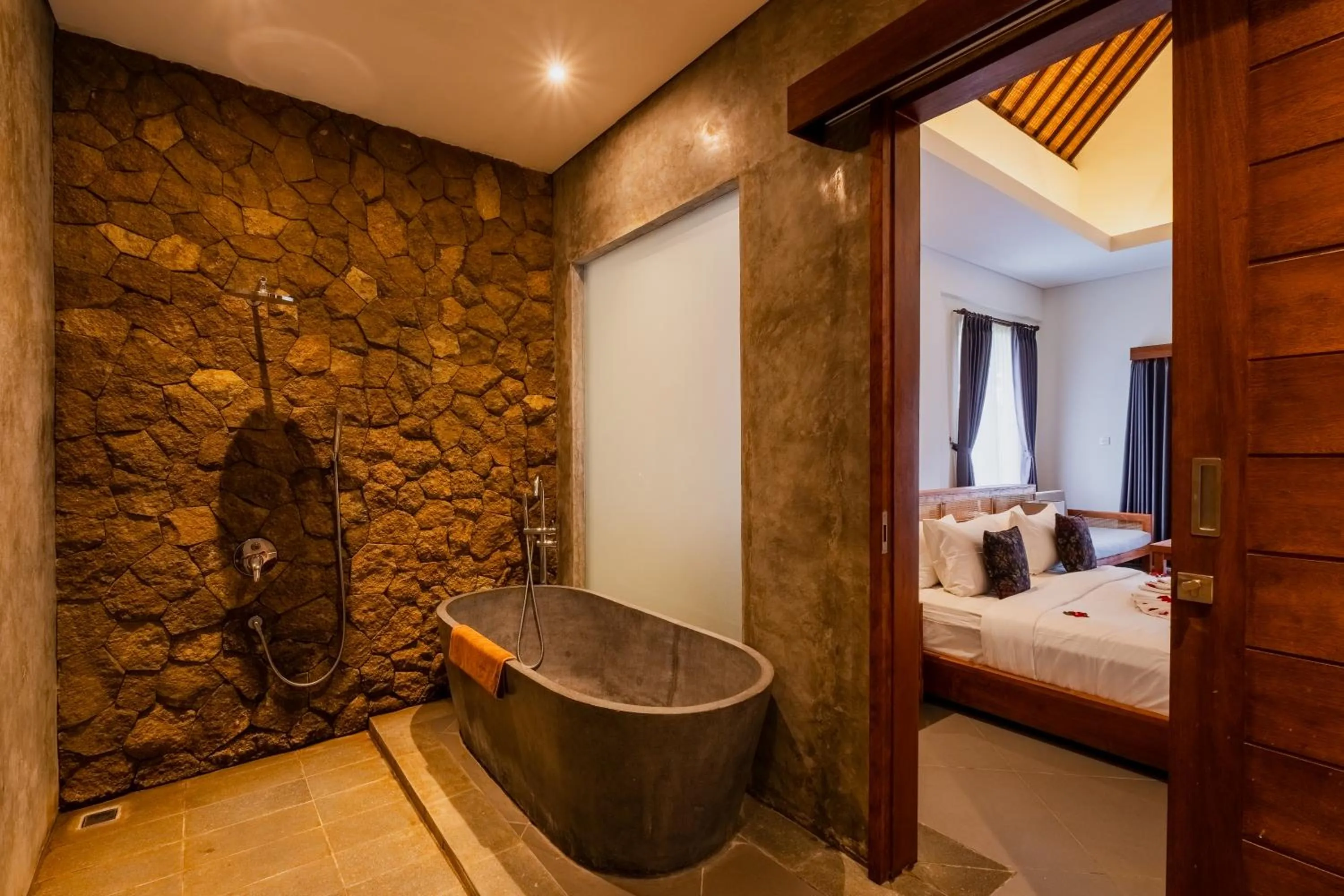 Bathroom, Bed in Alamdini Resort Ubud