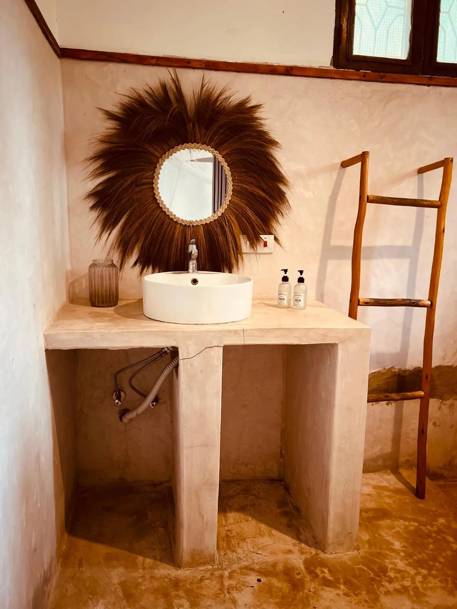 Bathroom in Mpole Bungalows