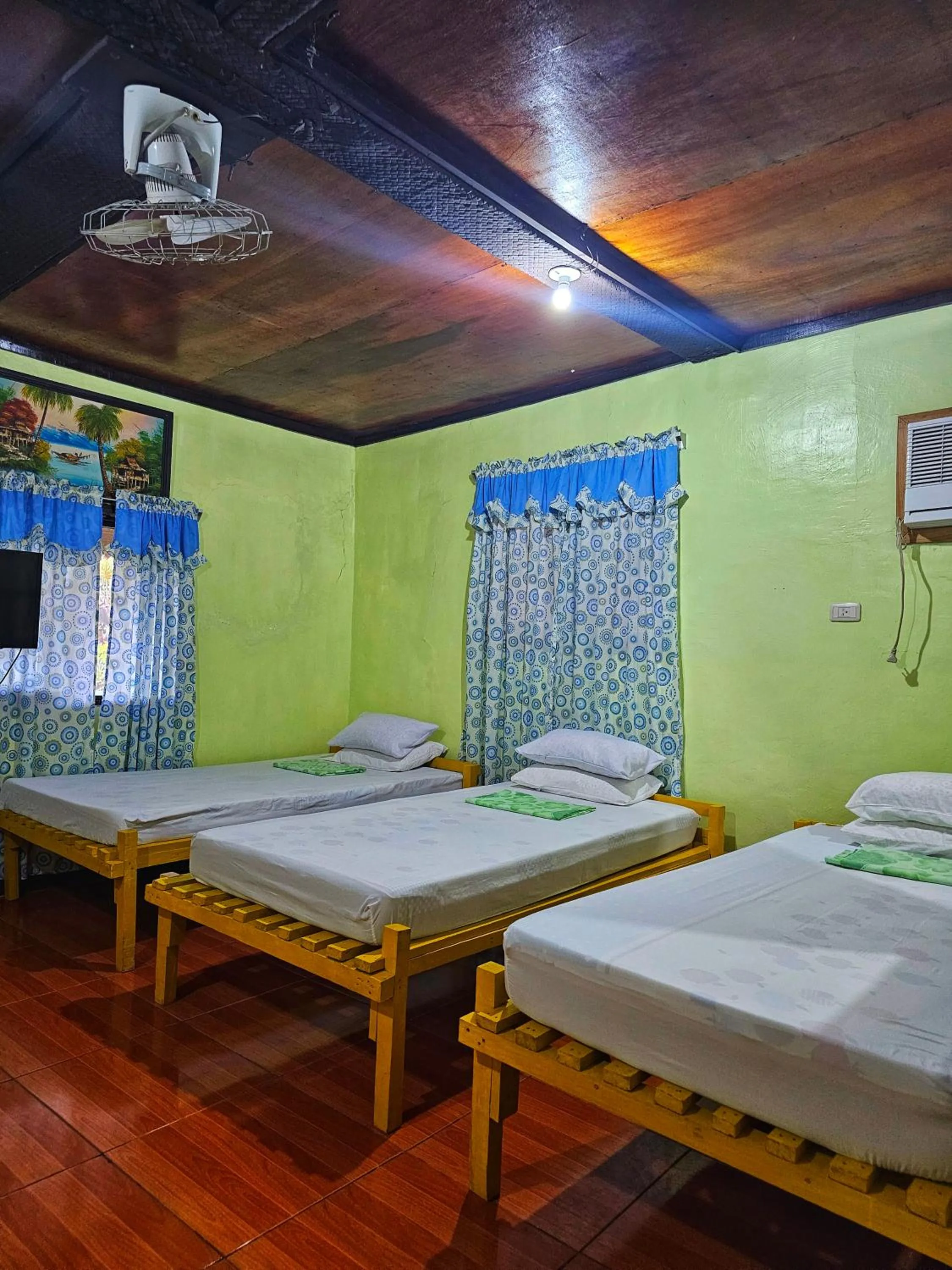 Bed in Bohol Sea Breeze Cottages and Resort