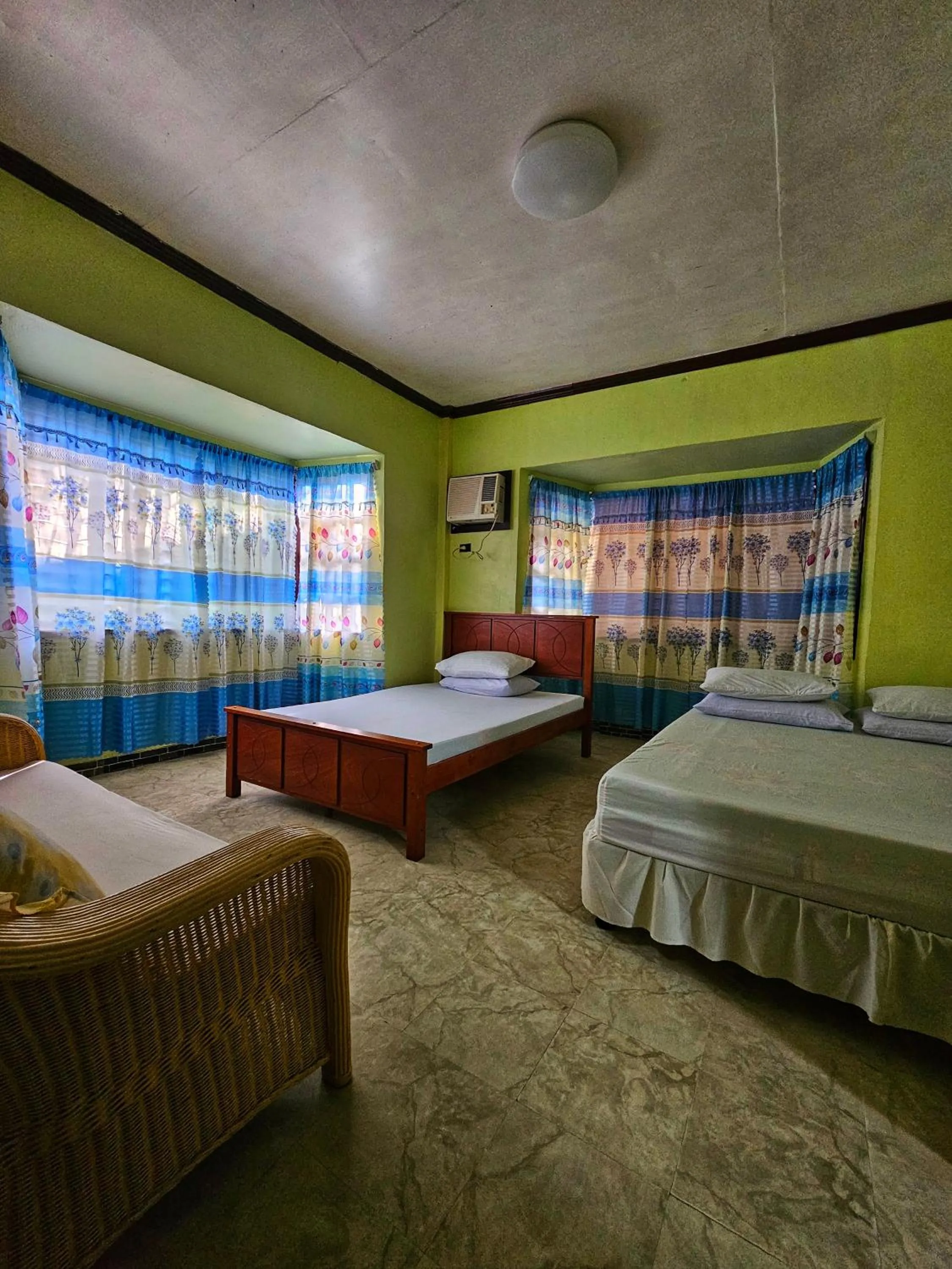 Bed in Bohol Sea Breeze Cottages and Resort