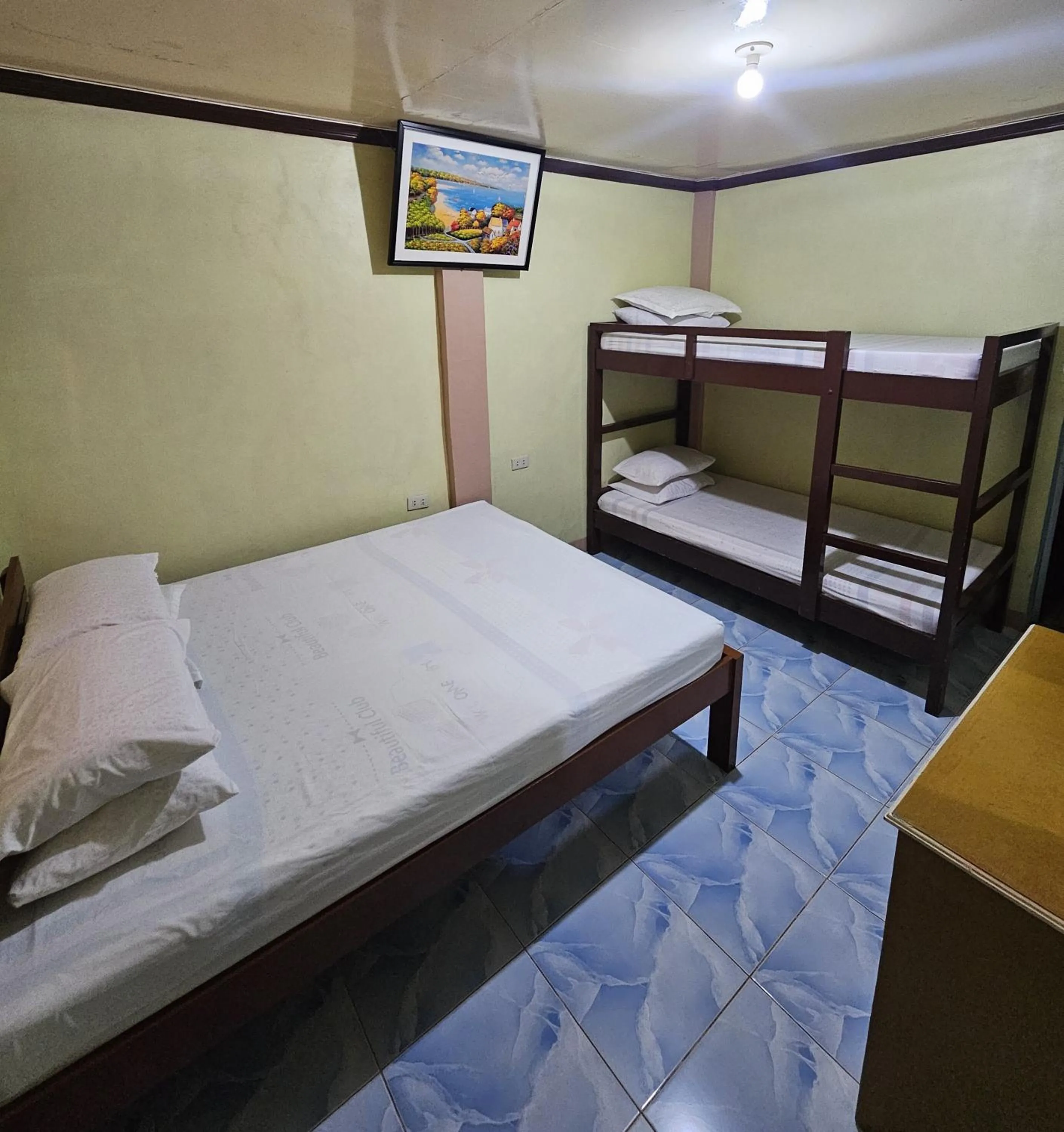 Bed in Bohol Sea Breeze Cottages and Resort