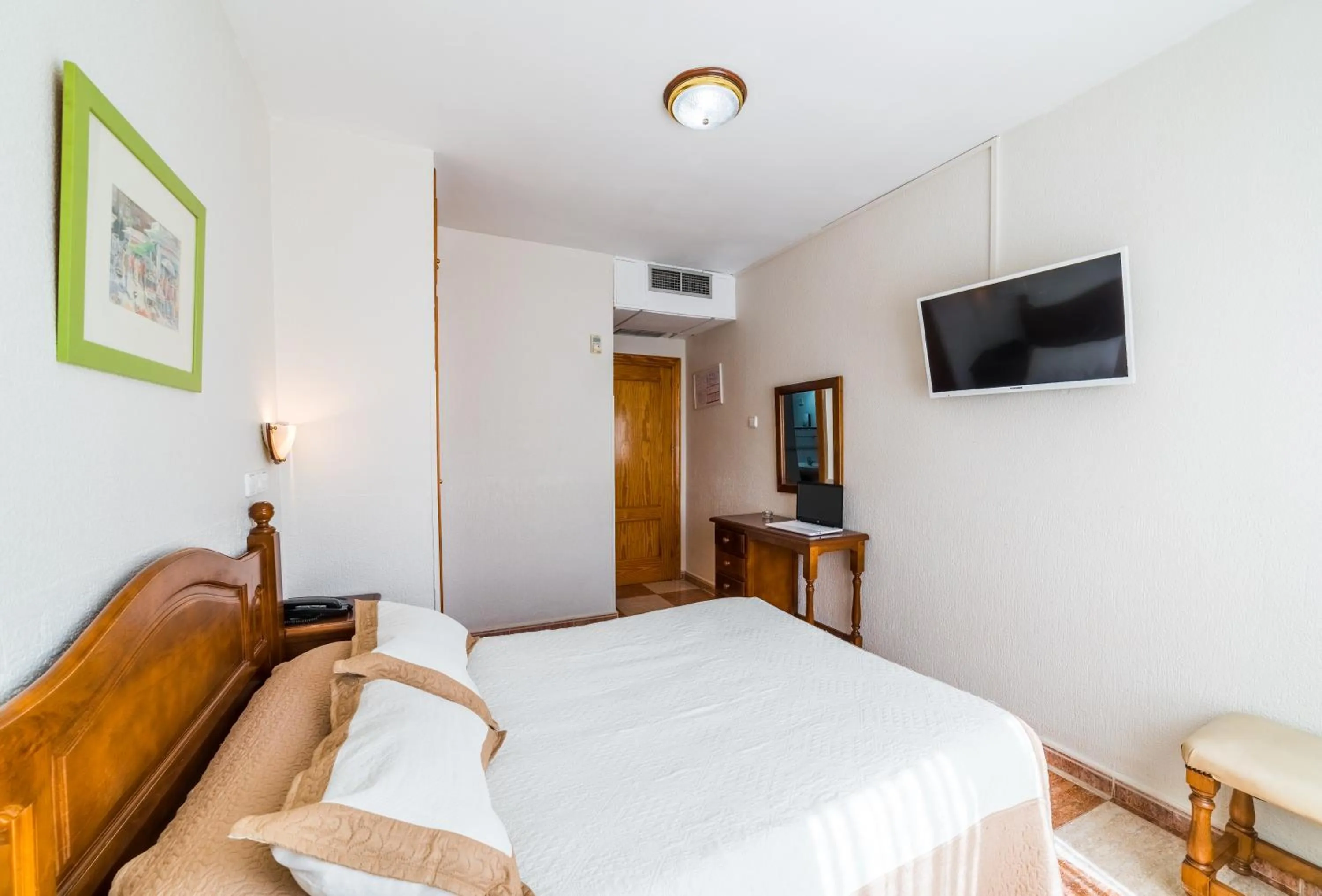 Bed in Hotel Sevilla